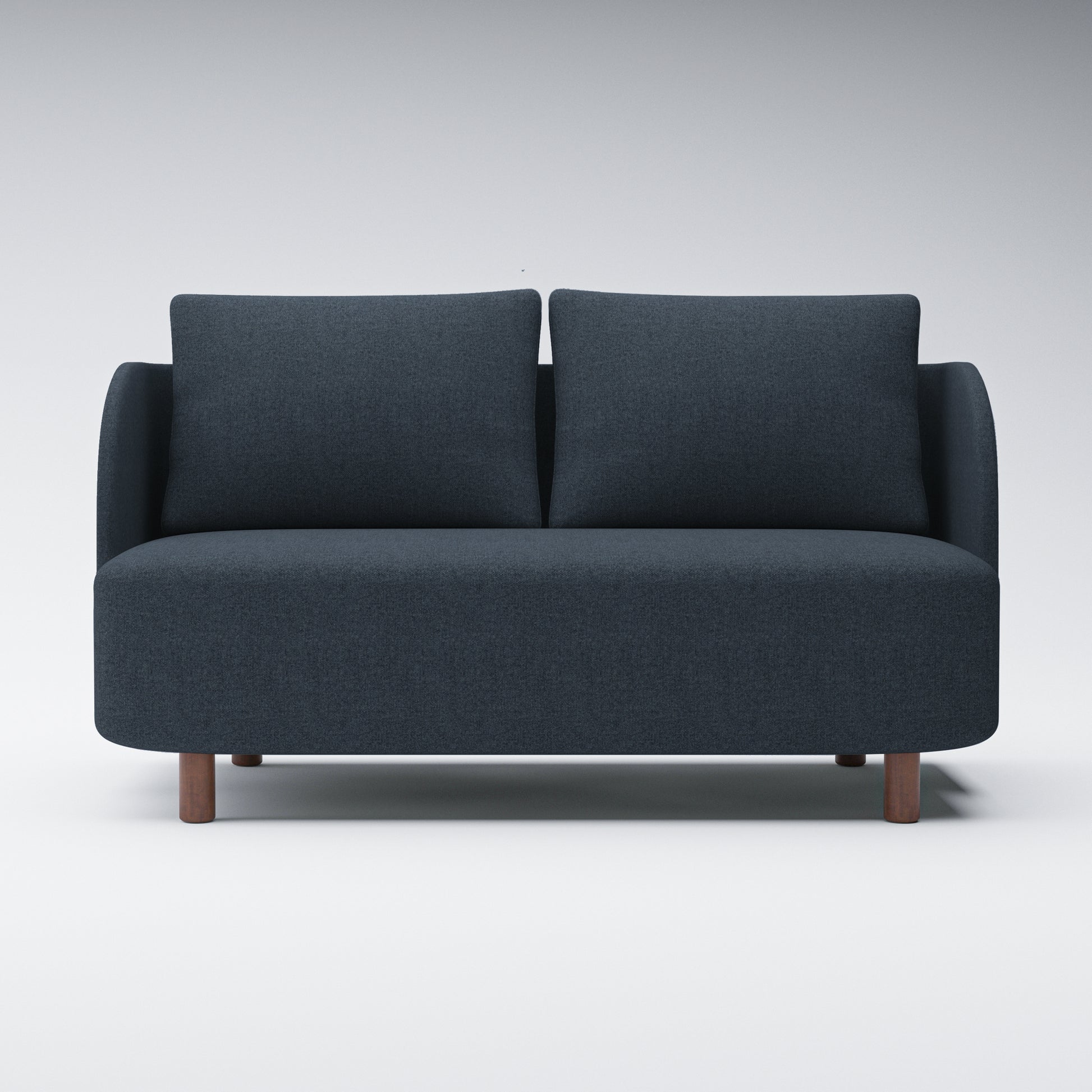 Nora Loveseat in Navy Blue shown from the front with two loose back cushions, curved side arms, a wide bench seat, and short brown cylindrical legs.