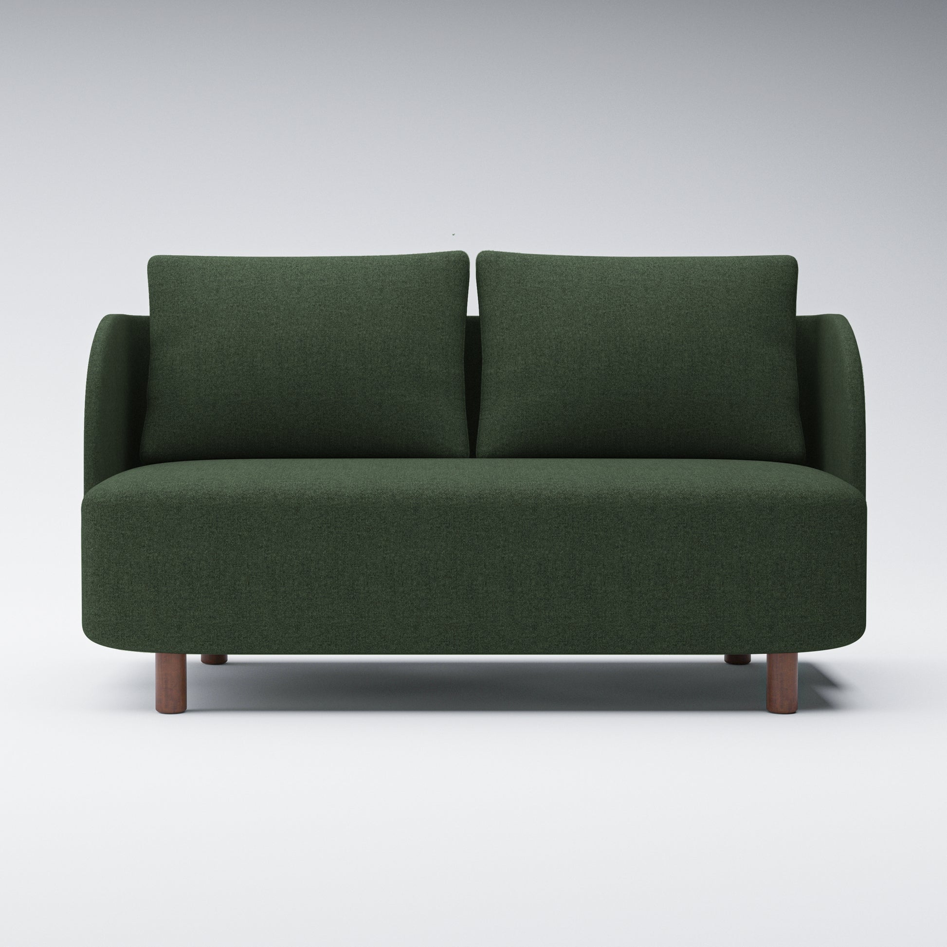 Nora Loveseat in Moss Green shown from the front with two loose back cushions, gently curved arms, a broad bench seat, and short brown cylindrical legs