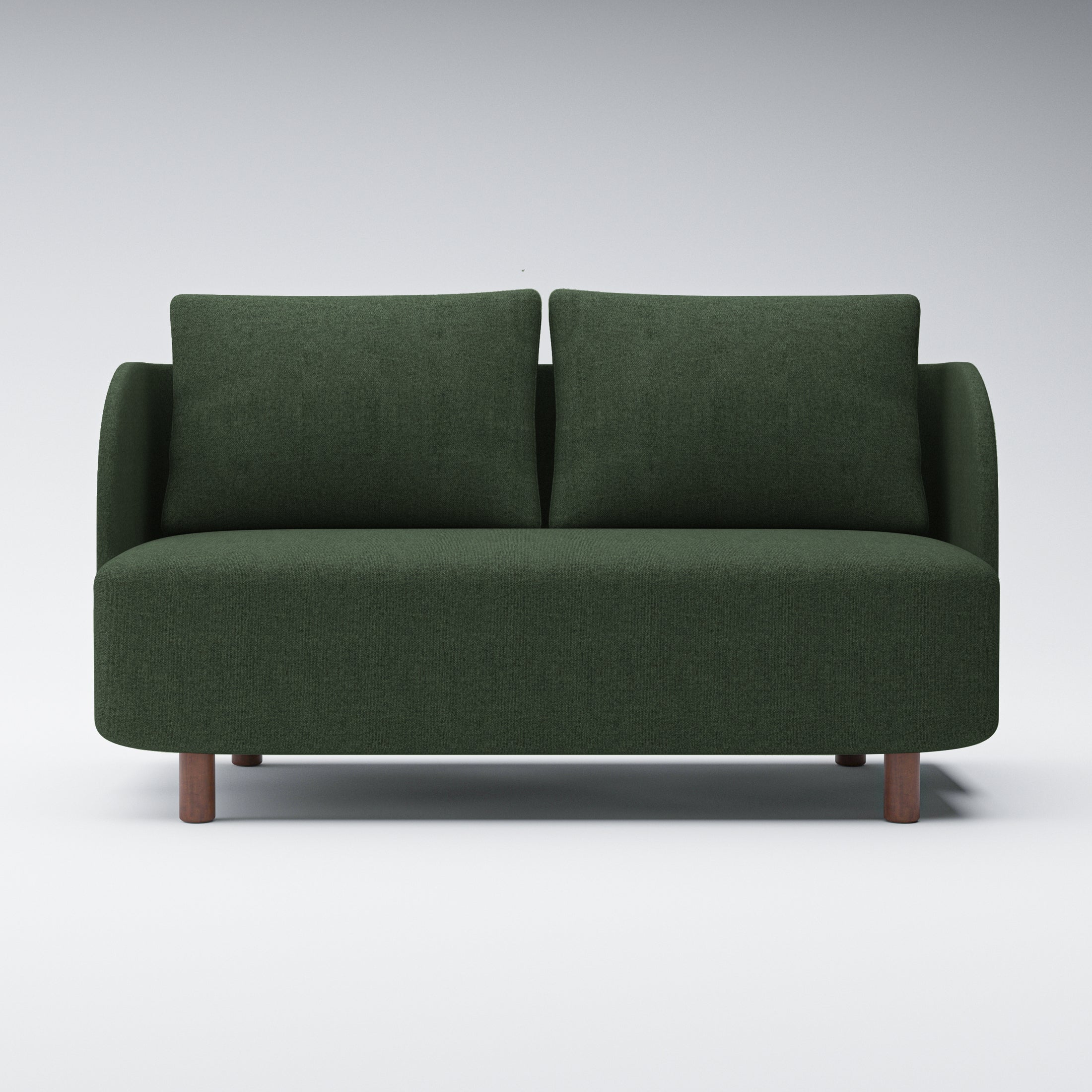 Nora Loveseat in Moss Green shown from the front with two loose back cushions, gently curved arms, a broad bench seat, and short brown cylindrical legs