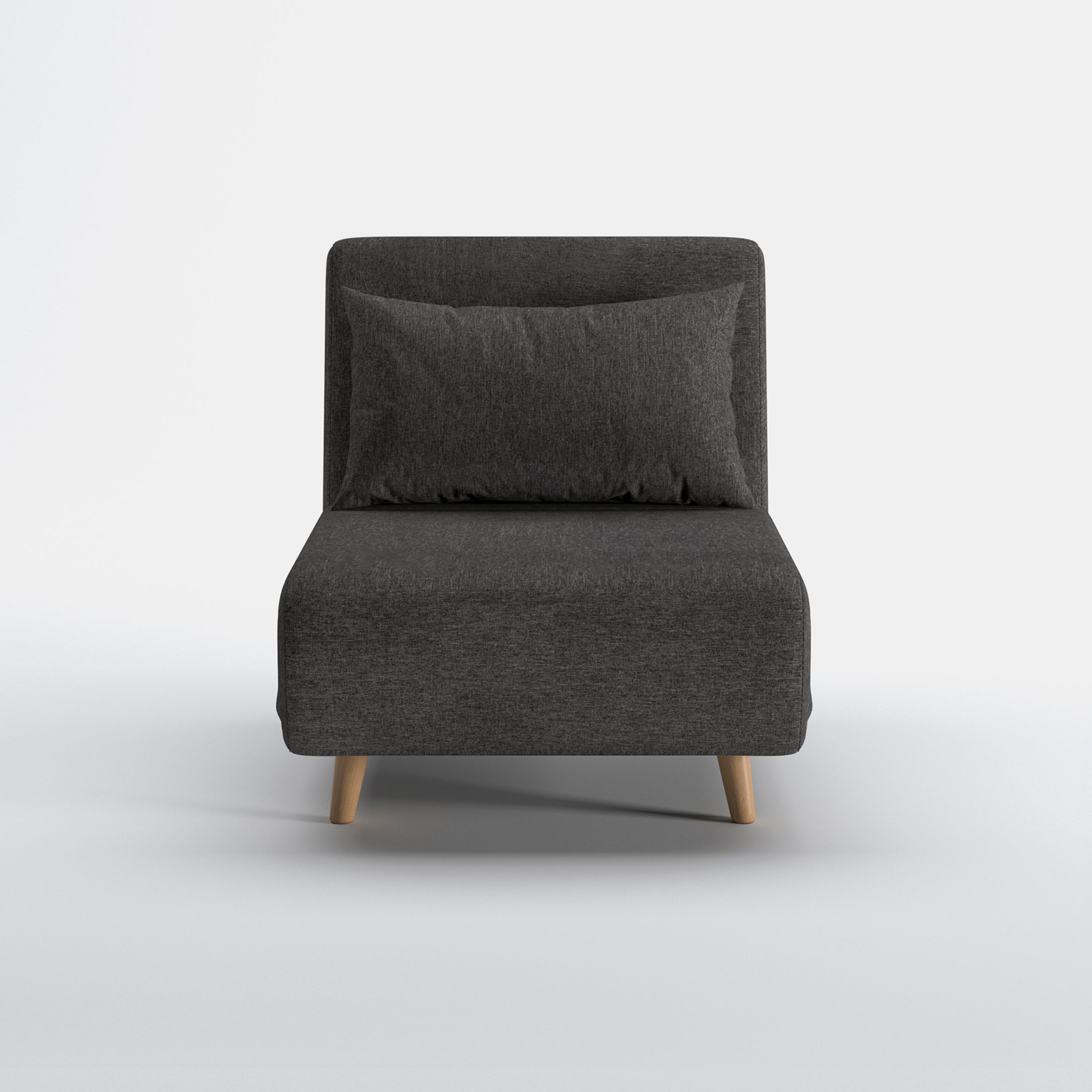 Tustin Convertible Chair in Charcoal shown from the front with a matching lumbar pillow, wide armless seat, upholstered backrest, and tapered natural wood legs.