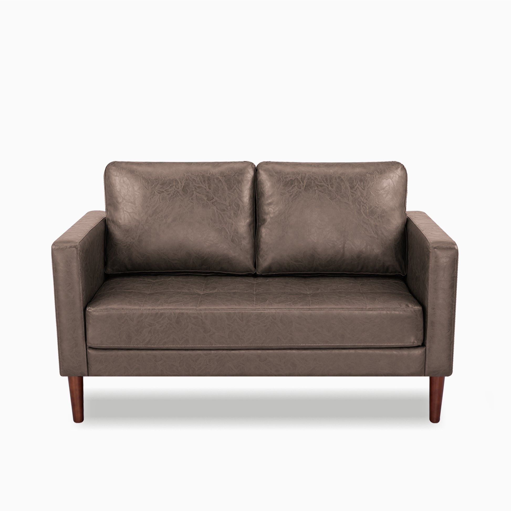 Orlando Loveseat in Faux Leather Brown shown from the front with two loose back cushions, a wide bench seat, track arms, and tapered dark brown legs.