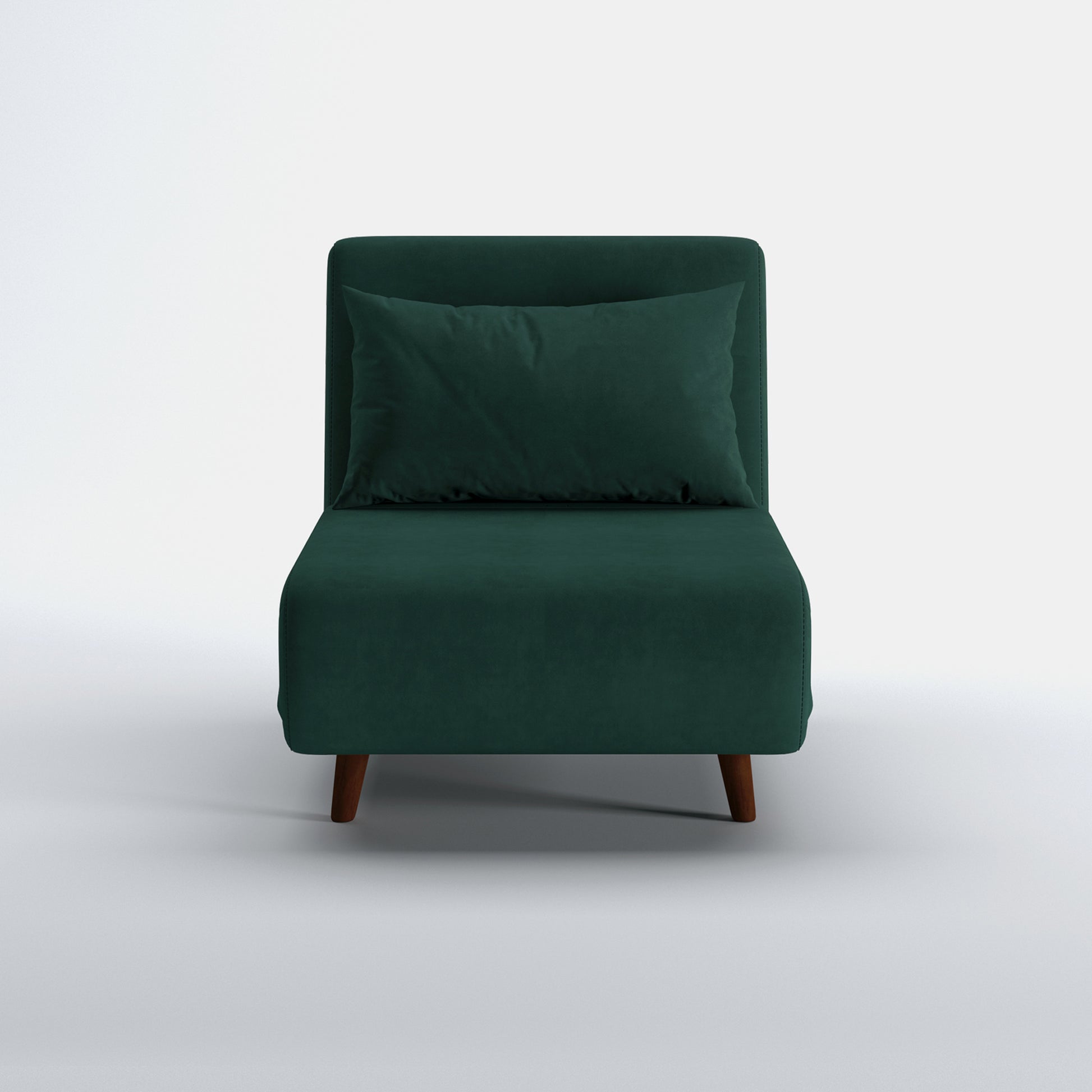 Tustin Convertible Chair in Velvet Green shown from the front with a matching lumbar pillow, wide armless seat, upholstered backrest, and tapered dark brown wood legs.
