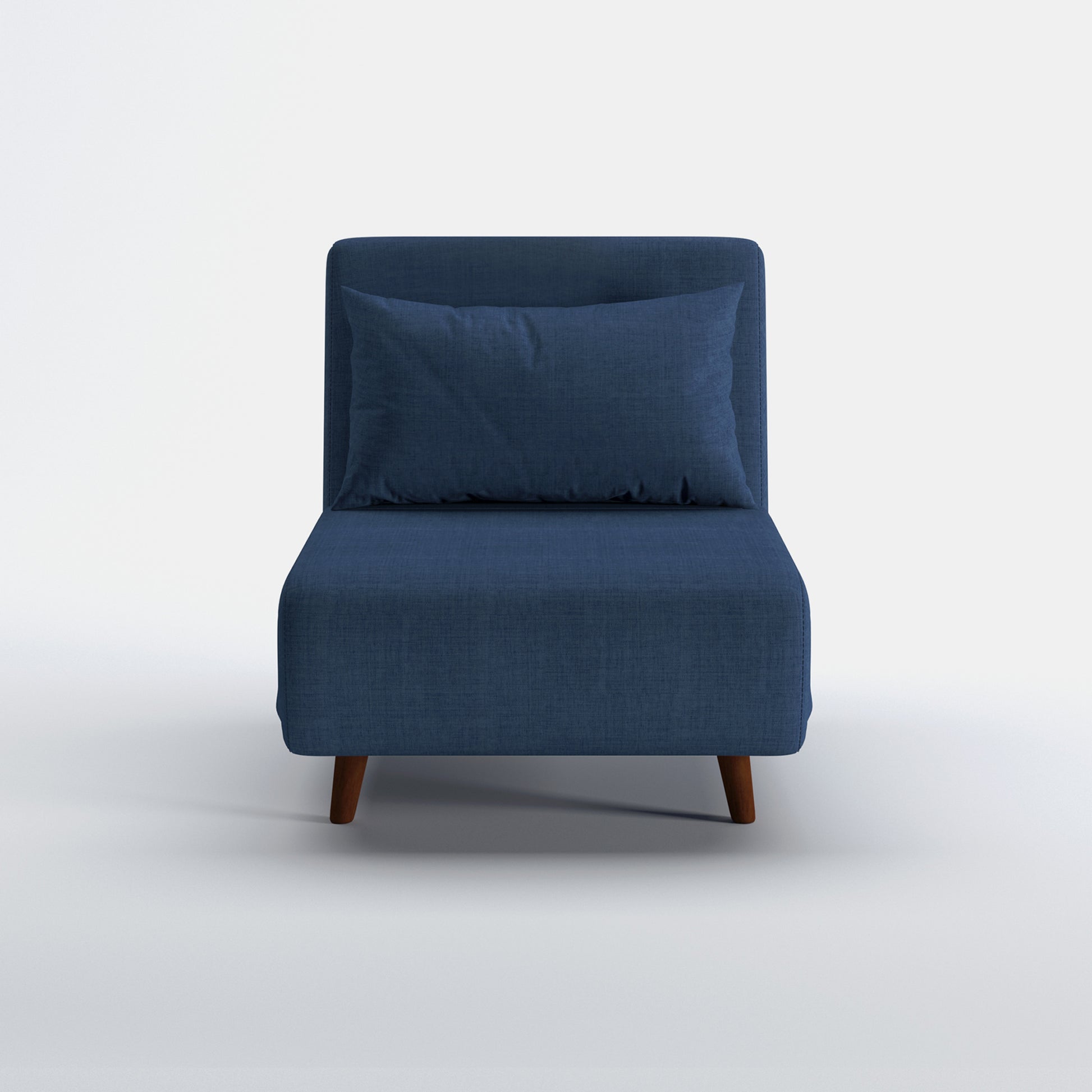 Tustin Convertible Chair in Blue shown from the front with a matching lumbar pillow, wide armless seat, upholstered backrest, and tapered dark brown wood legs.