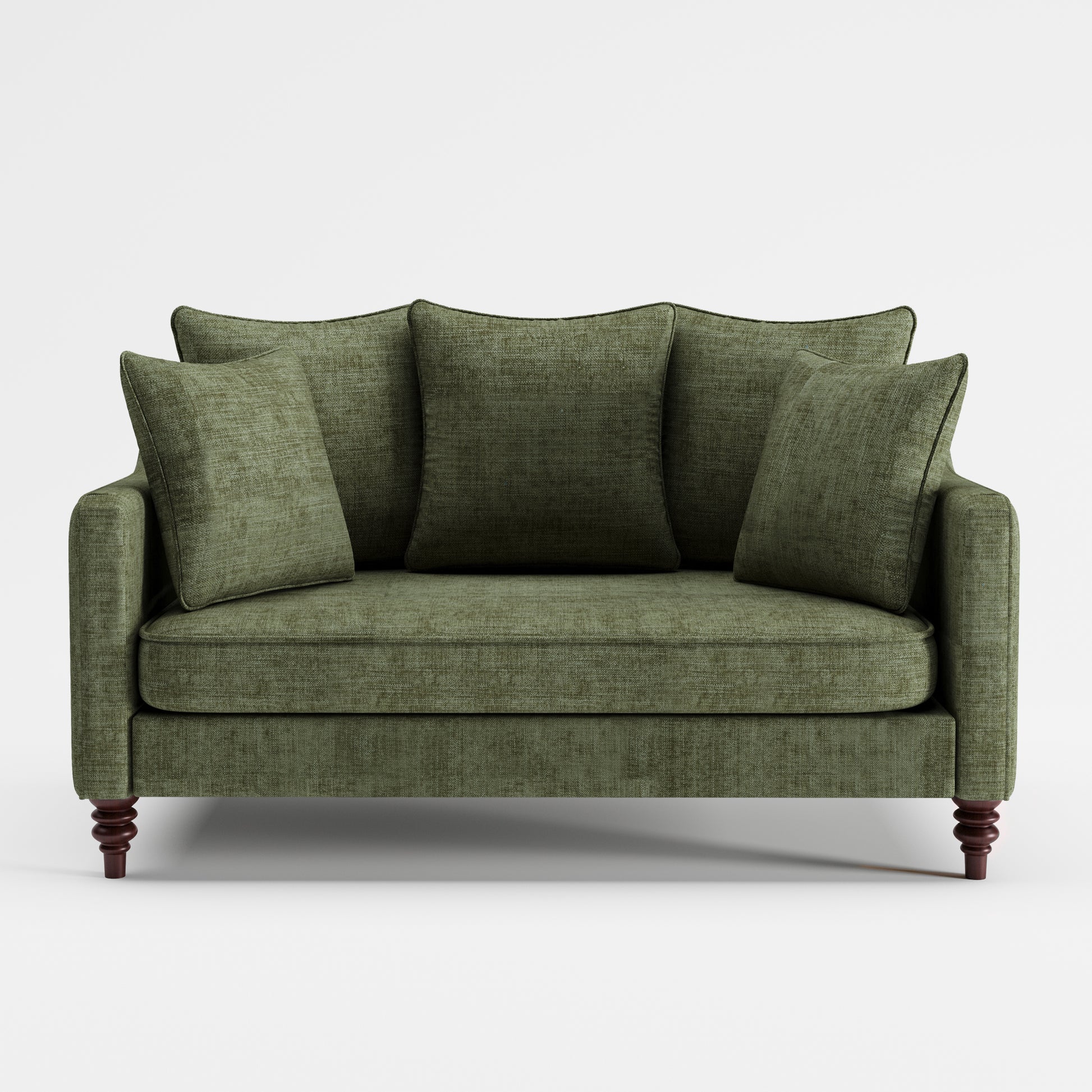 Madison Loveseat in Sage Green shown from the front with three plush back cushions, two throw pillows, a wide bench seat, slim track arms, and turned dark brown legs.