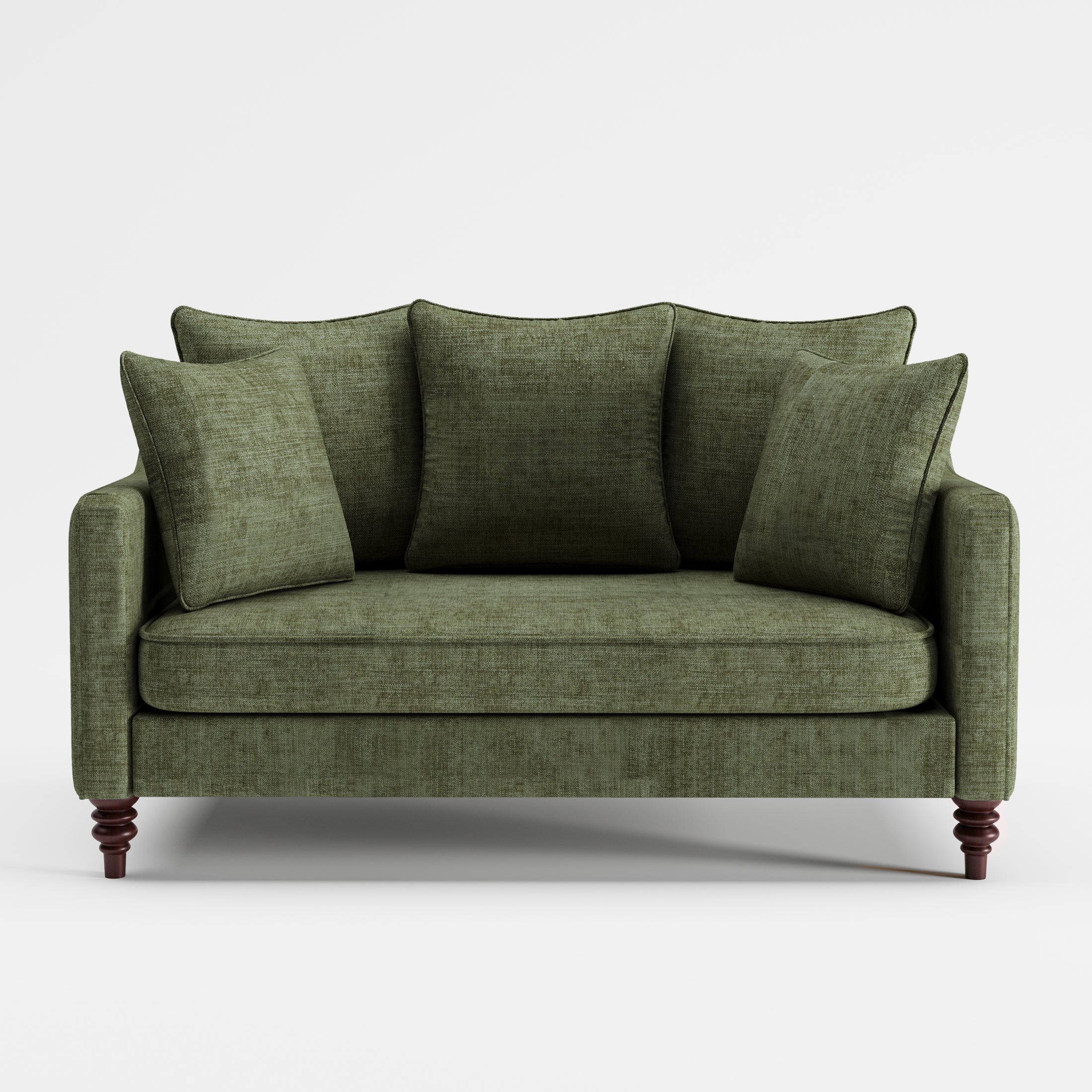 Madison Loveseat in Sage Green shown from the front with three plush back cushions, two throw pillows, a wide bench seat, slim track arms, and turned dark brown legs.