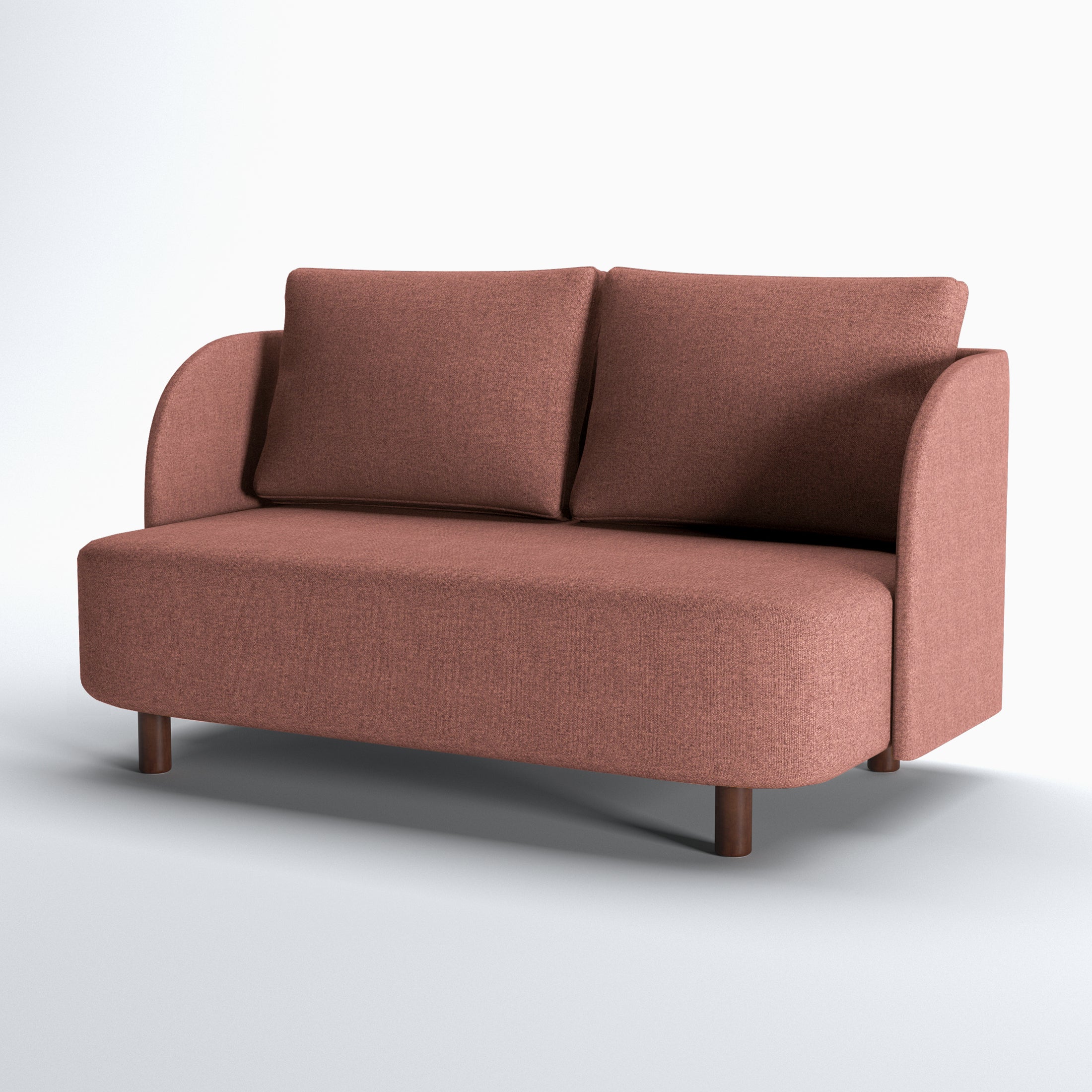 Nora Loveseat in Dusty Rose shown at a three-quarter angle, highlighting the paired back cushions, rounded seat base, curved arms, and brown legs.