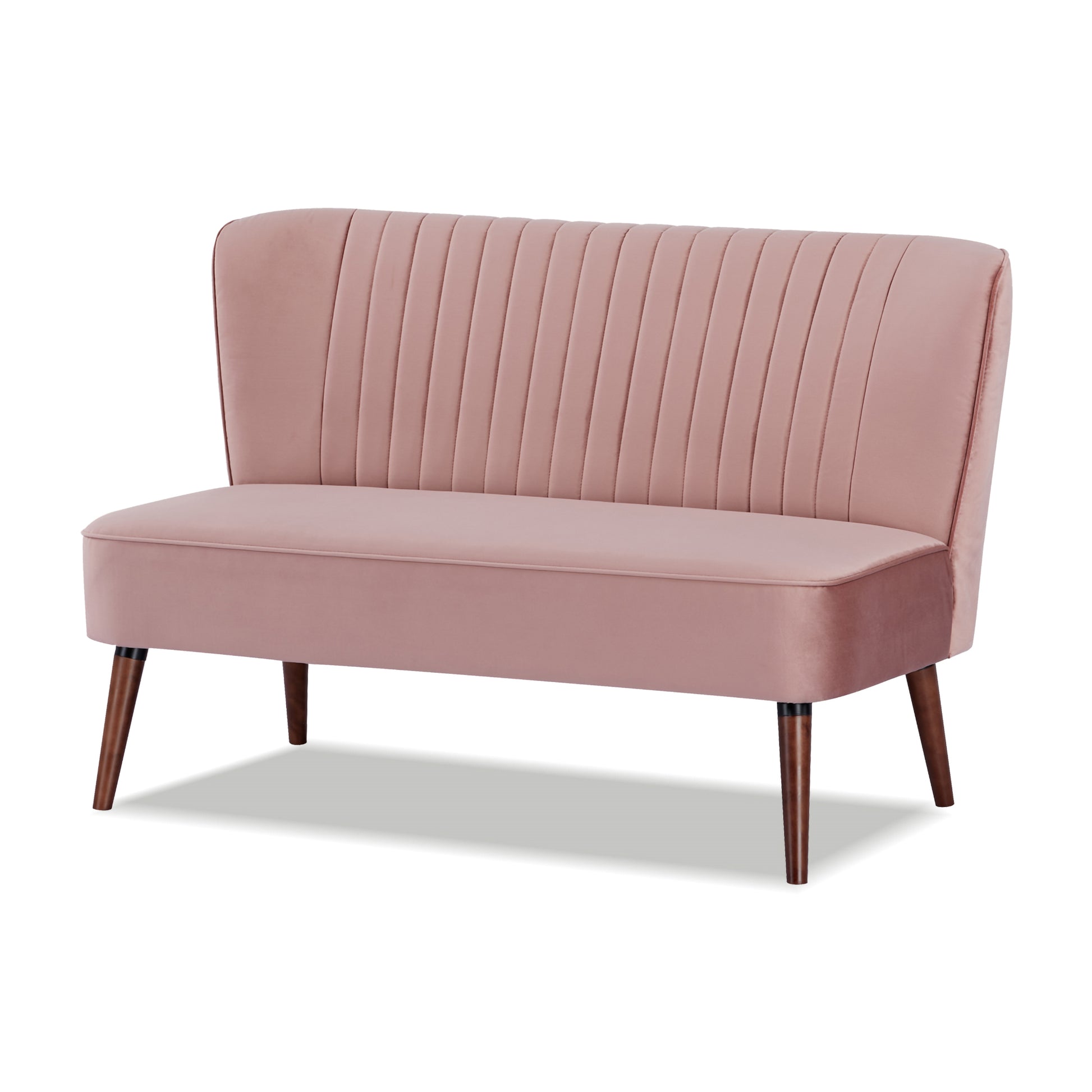 Hollywood Loveseat in Velvet Blush shown from a front angle, highlighting its blush velvet upholstery, vertical channel tufting, wide seat, and angled brown legs