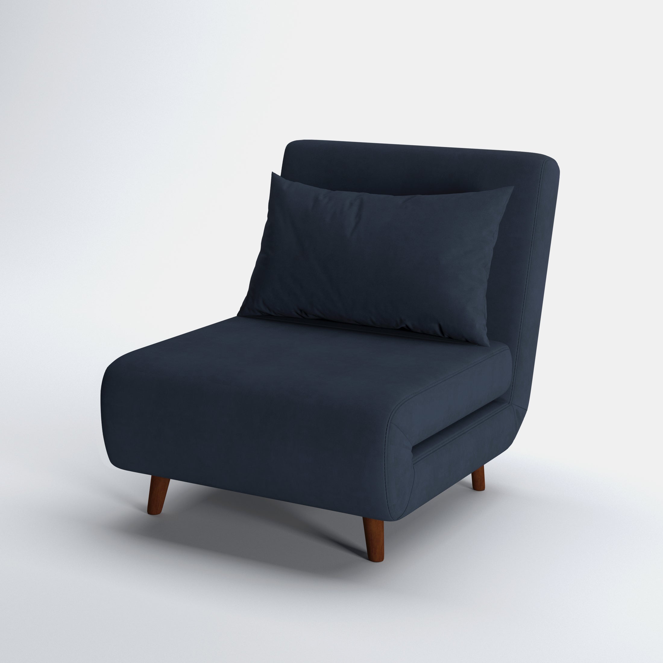 Tustin Convertible Chair in Velvet Blue shown from a front angle, highlighting its soft velvet upholstery, rounded seat, matching pillow, and angled dark brown wood legs.