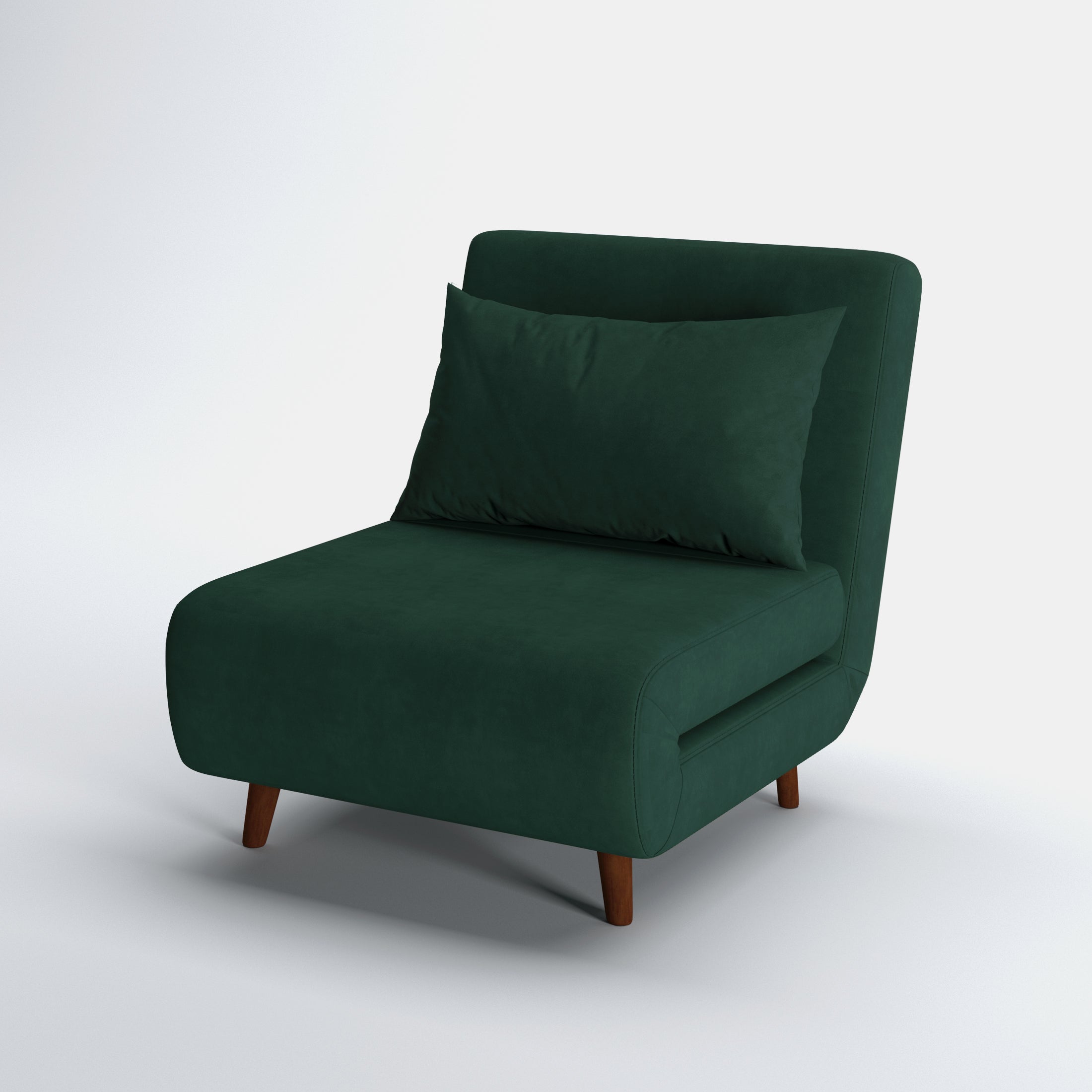 Tustin Convertible Chair in Velvet Green shown from a front angle, highlighting its soft velvet upholstery, rounded seat, matching pillow, and angled dark brown wood legs.