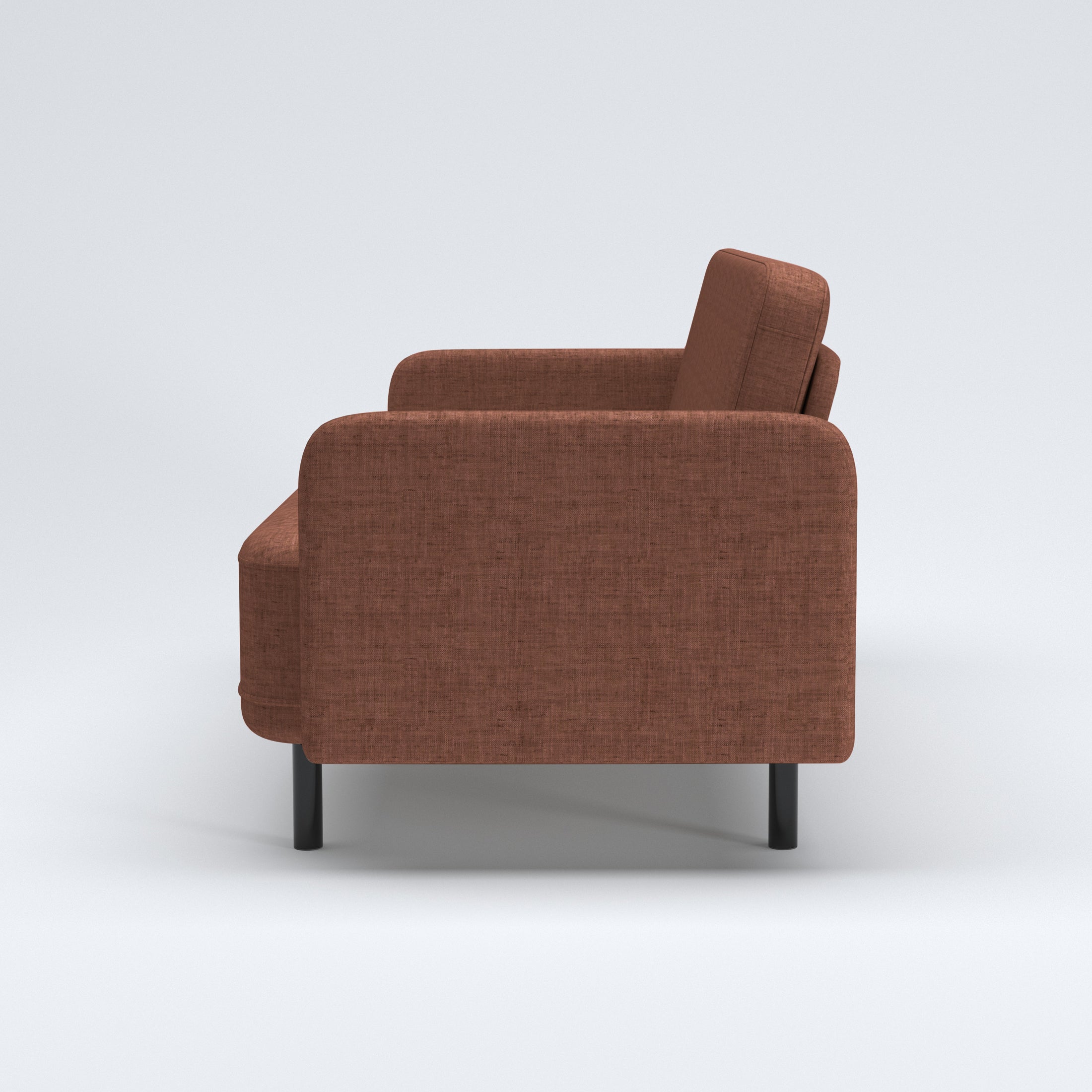 Metro Loveseat in Rosewood Blush shown from the side, displaying its upright backrest, deep bench seat, slim upholstered arm, and short black legs.