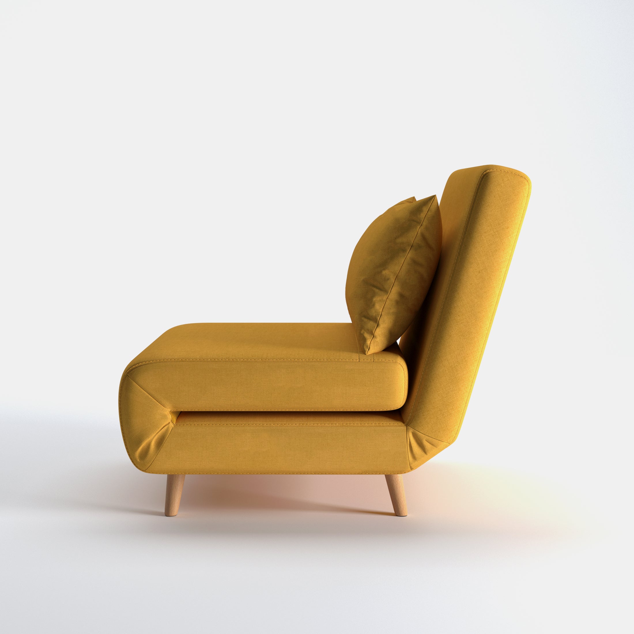 Tustin Convertible Chair in Mustard shown from the side with a thick cushioned seat, reclining backrest, matching lumbar pillow, and tapered wood legs.