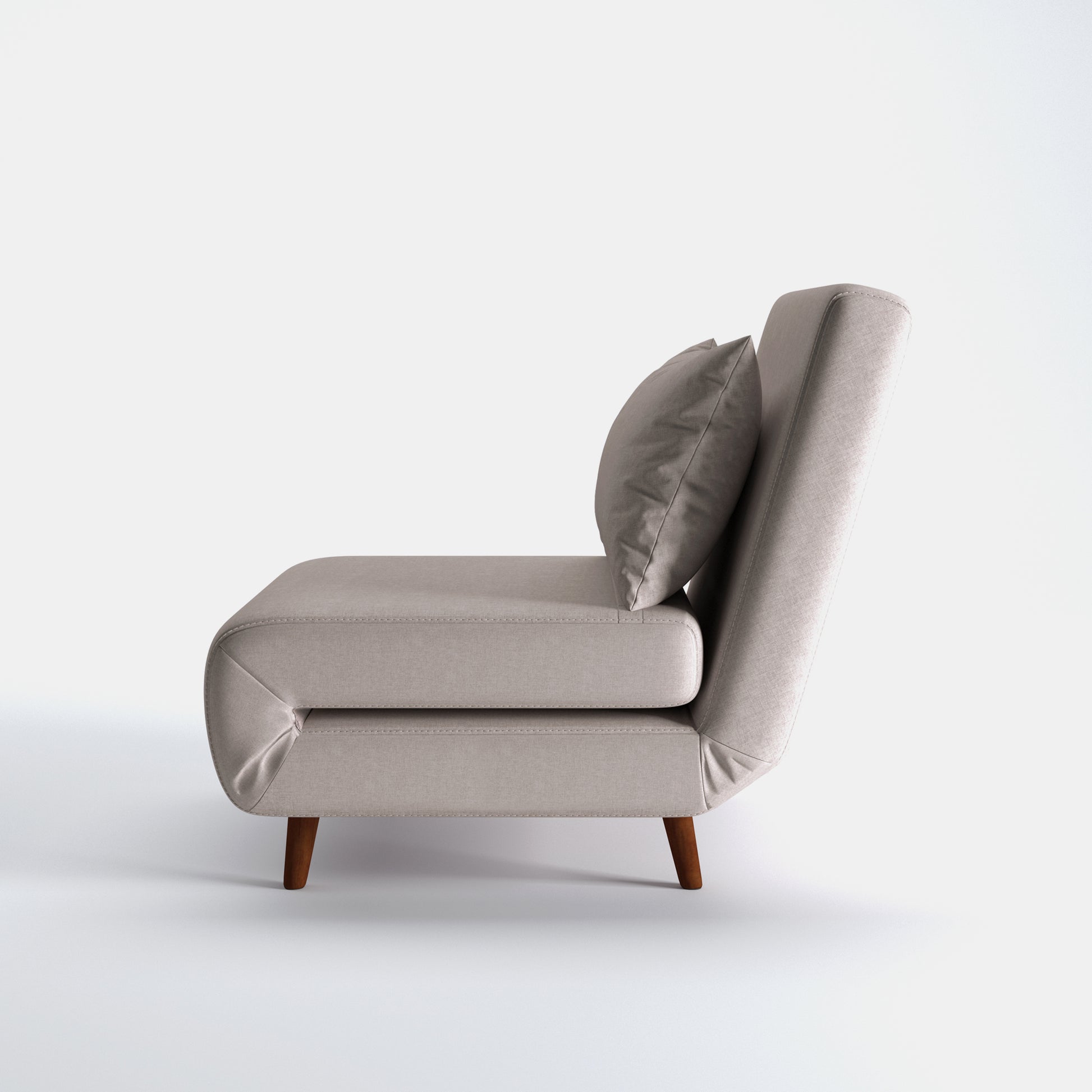Tustin Convertible Chair in Beige shown from the side with a thick cushioned seat, reclining backrest, matching lumbar pillow, and tapered dark brown wood legs.