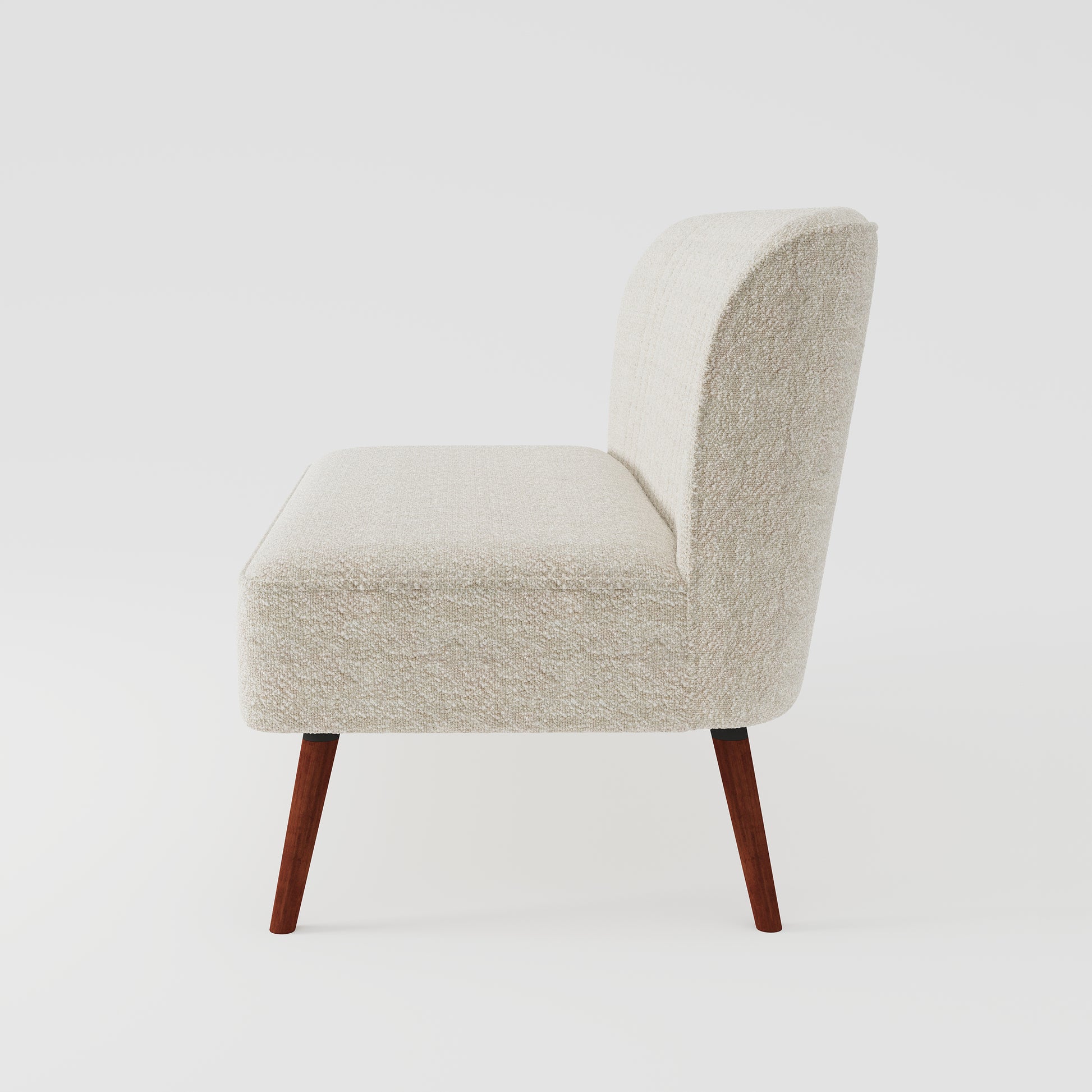 Hollywood Loveseat in Ivory shown from the side, displaying its deep upholstered seat, tall curved backrest, textured fabric, and tapered brown legs