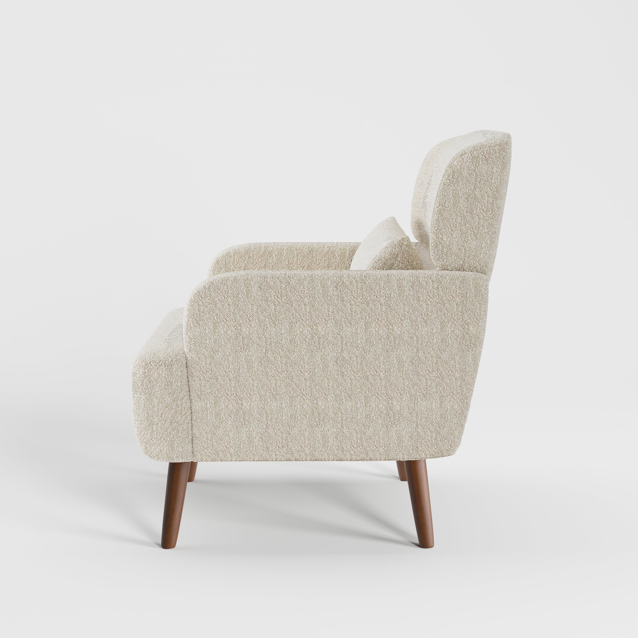 Arlo Accent Armchair in Ivory Tweed Color shown from the side, showcasing its deep seat, supportive backrest, rounded arm design, and solid wood legs.