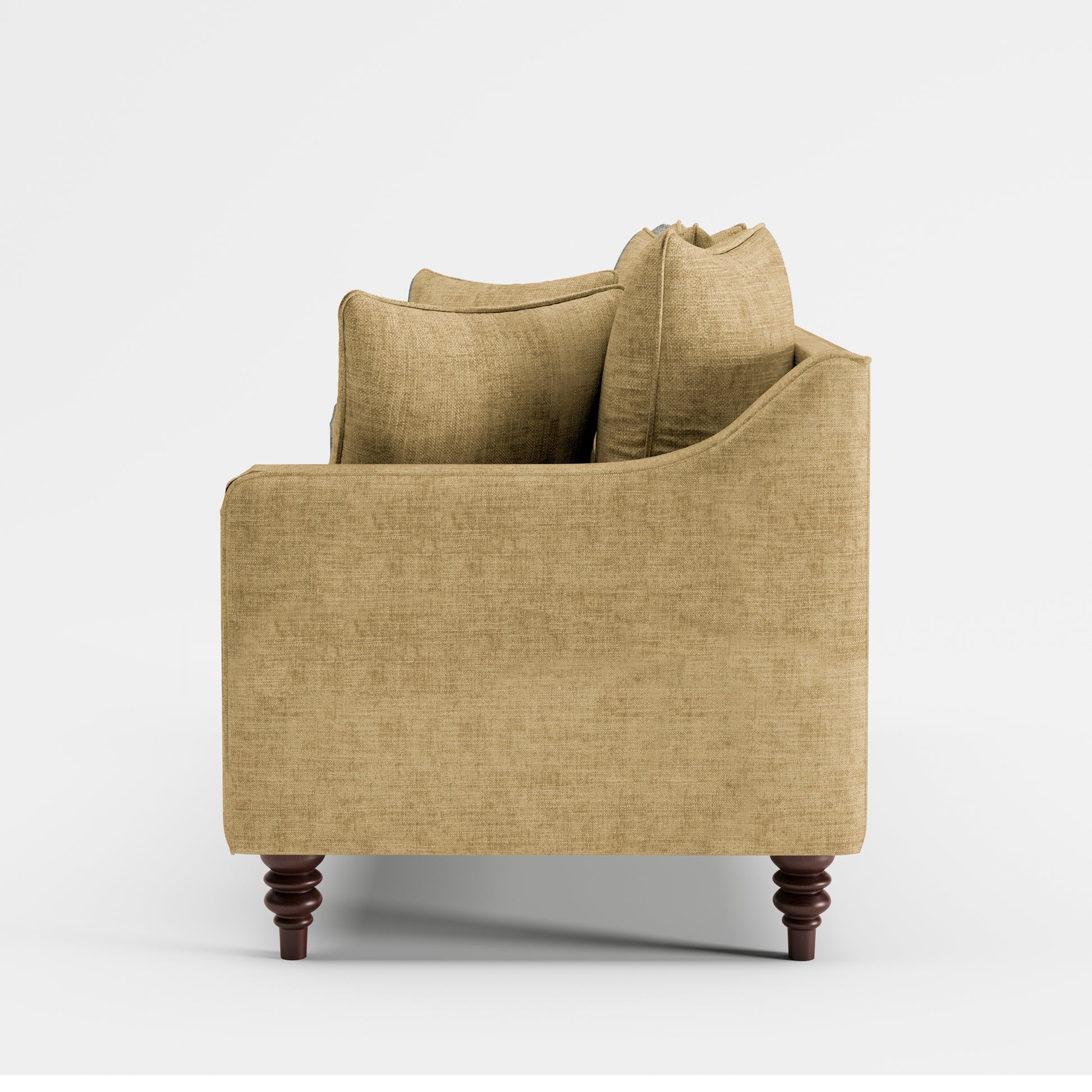 Madison Loveseat in Sand Beige shown from the side with a deep upholstered seat, gently sloped arm, layered back cushions, and turned dark brown legs.