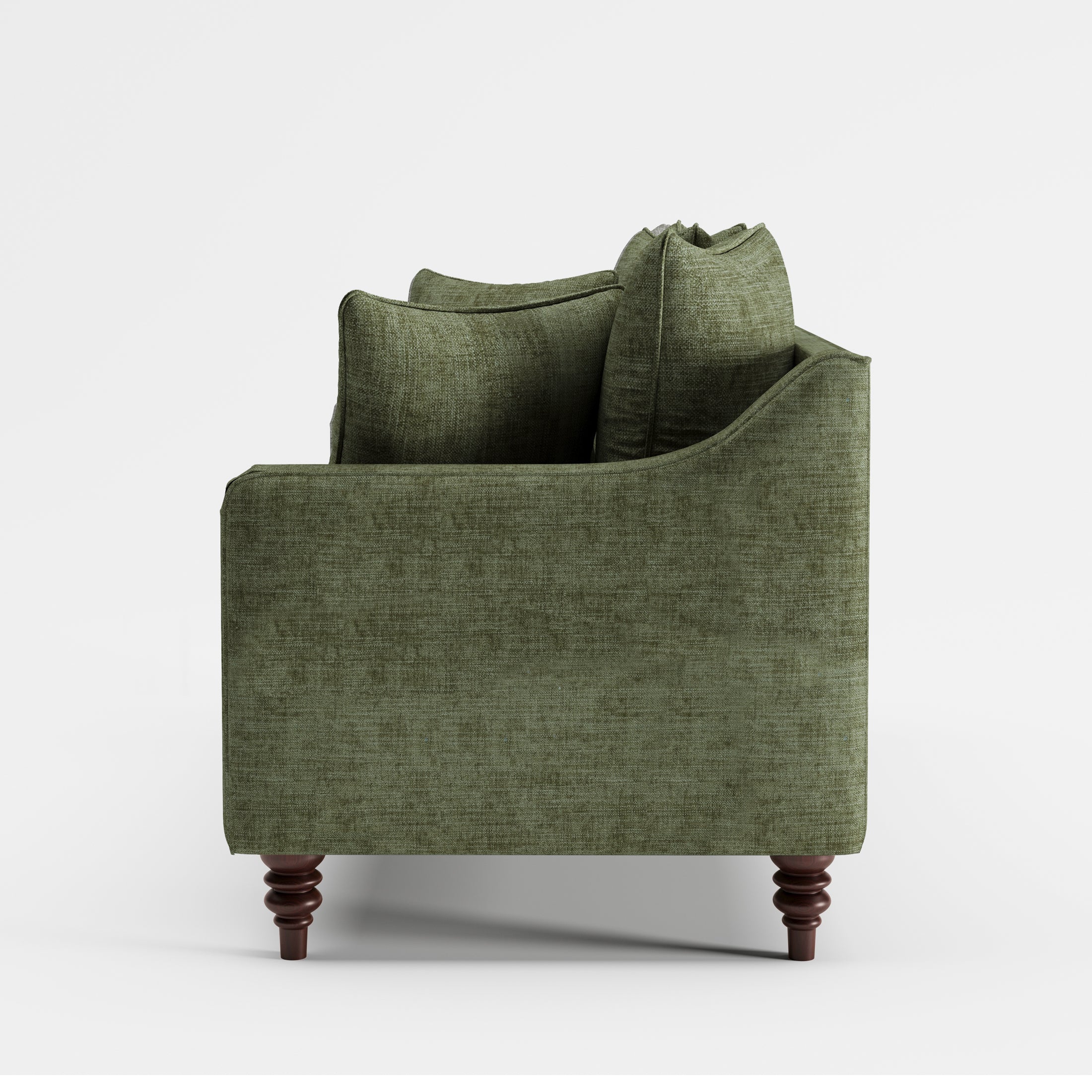 Madison Loveseat in Sage Green shown from the side with a deep upholstered seat, gently sloped arm, layered back cushions, and turned dark brown legs.
