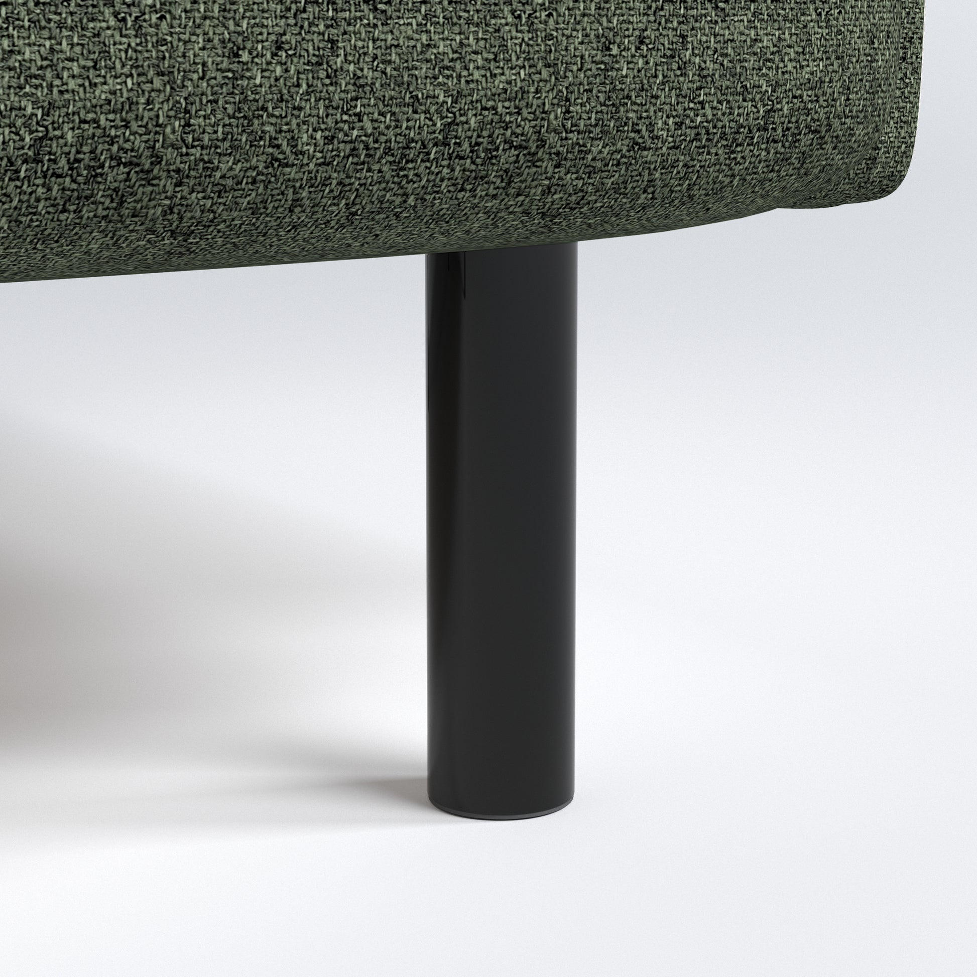 Metro Loveseat in Olive Green featuring a close-up of the black cylindrical leg beneath the rounded seat base and textured green upholstery