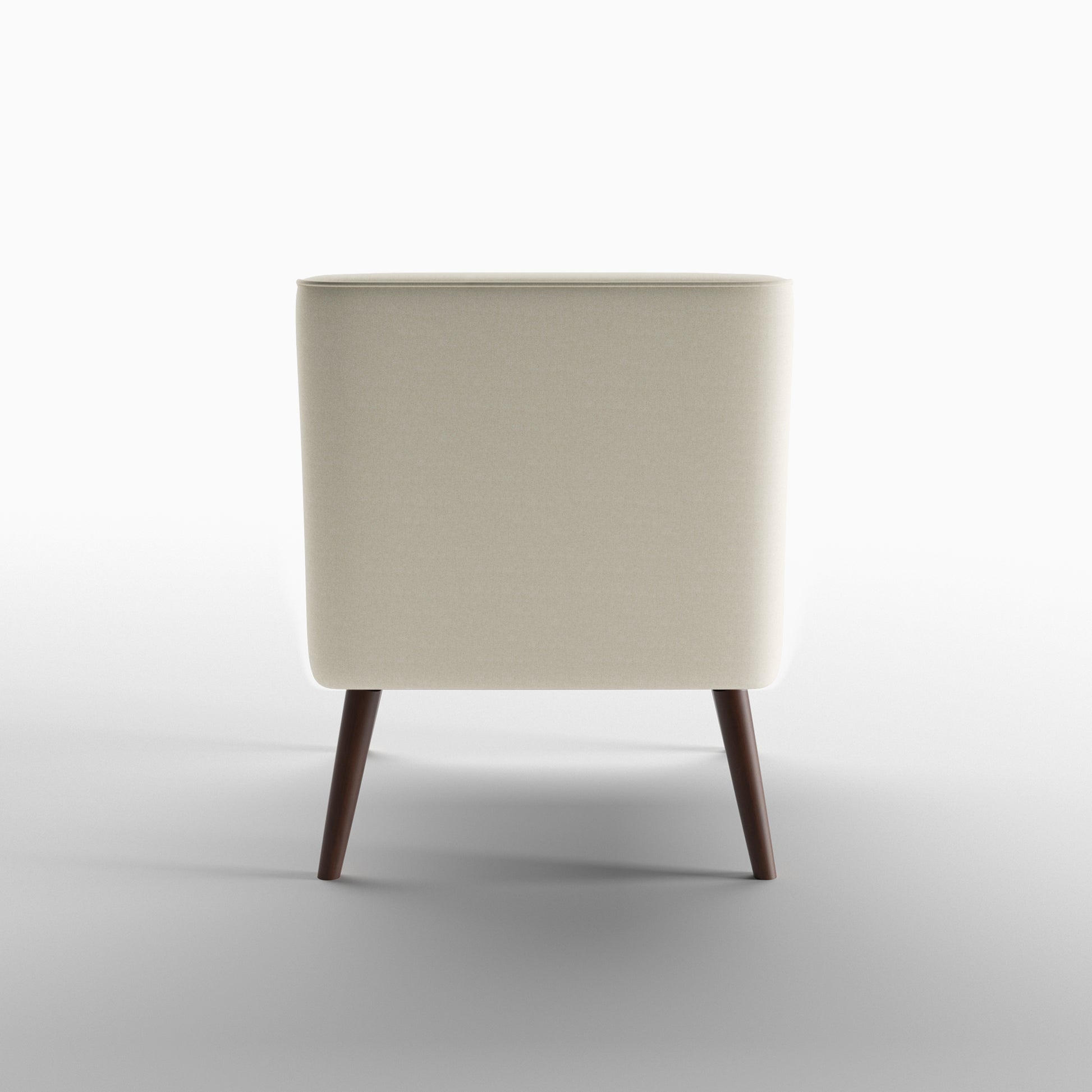 Dana Accent Chair in Faux Linen Beige shown from the rear, featuring a fully upholstered curved back panel with piped edging and two tapered brown legs