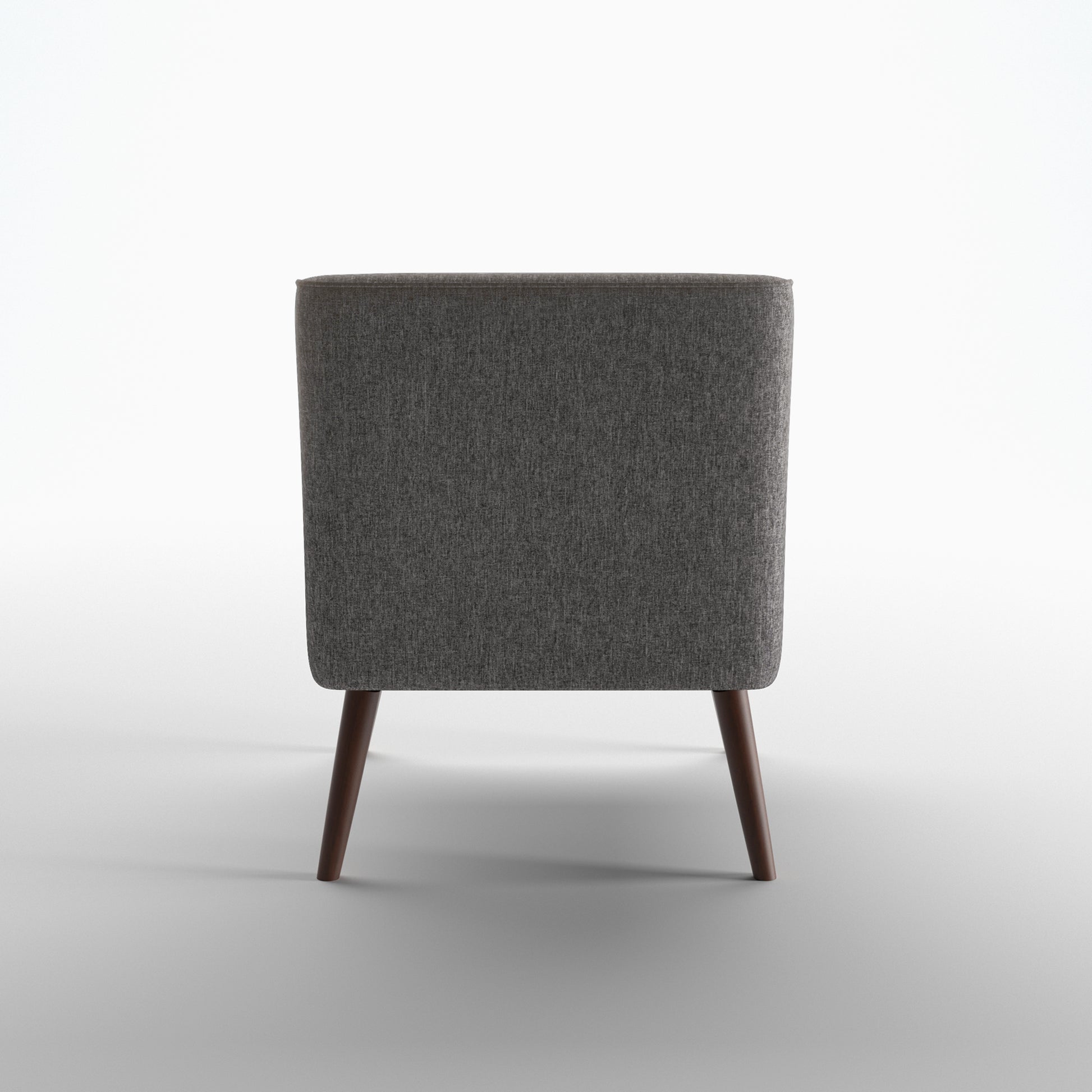 Dana Accent Chair in Faux Linen Dark Gray shown from the rear, featuring a fully upholstered curved back panel with piped edging and two tapered brown legs