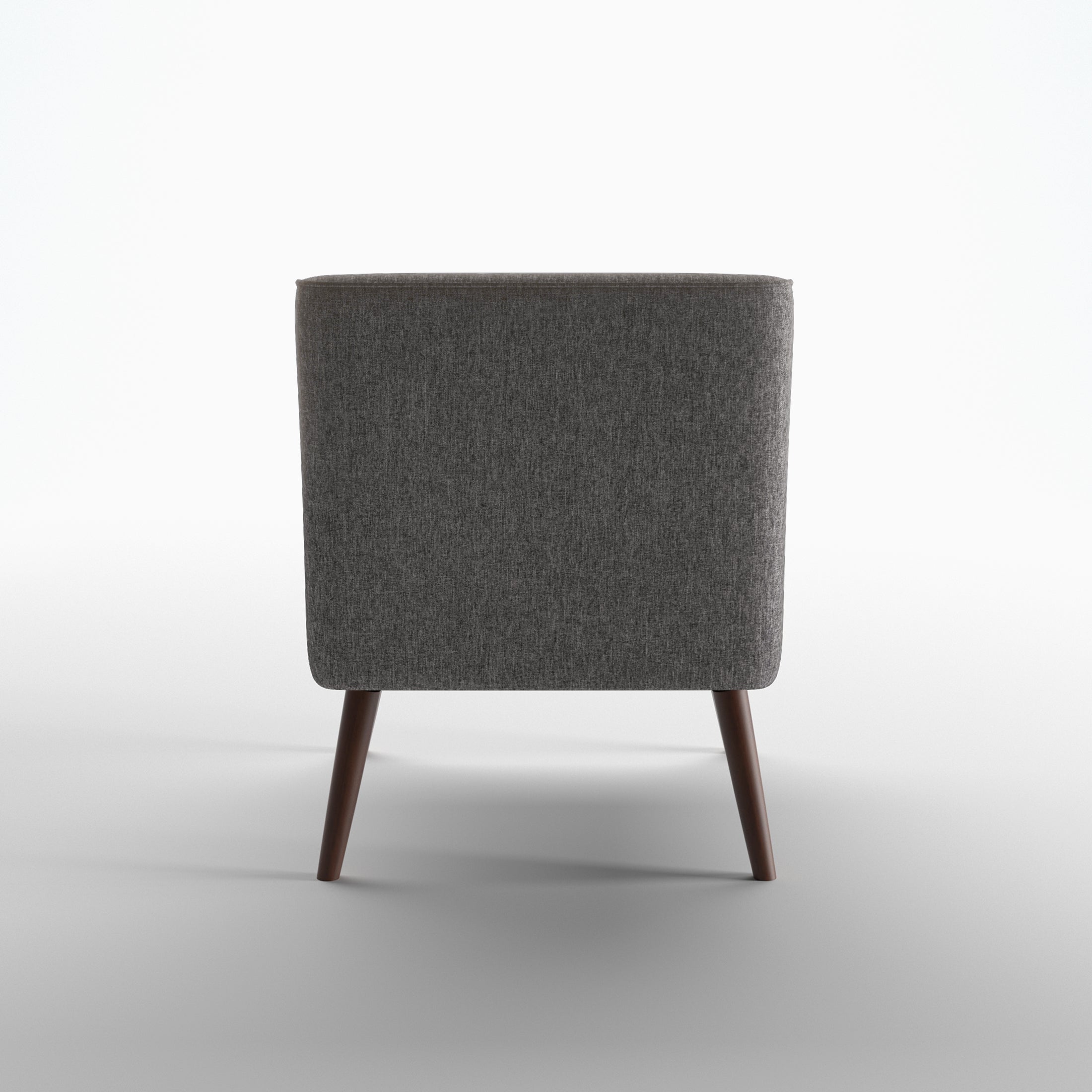Dana Accent Chair in Faux Linen Dark Gray shown from the rear, featuring a fully upholstered curved back panel with piped edging and two tapered brown legs