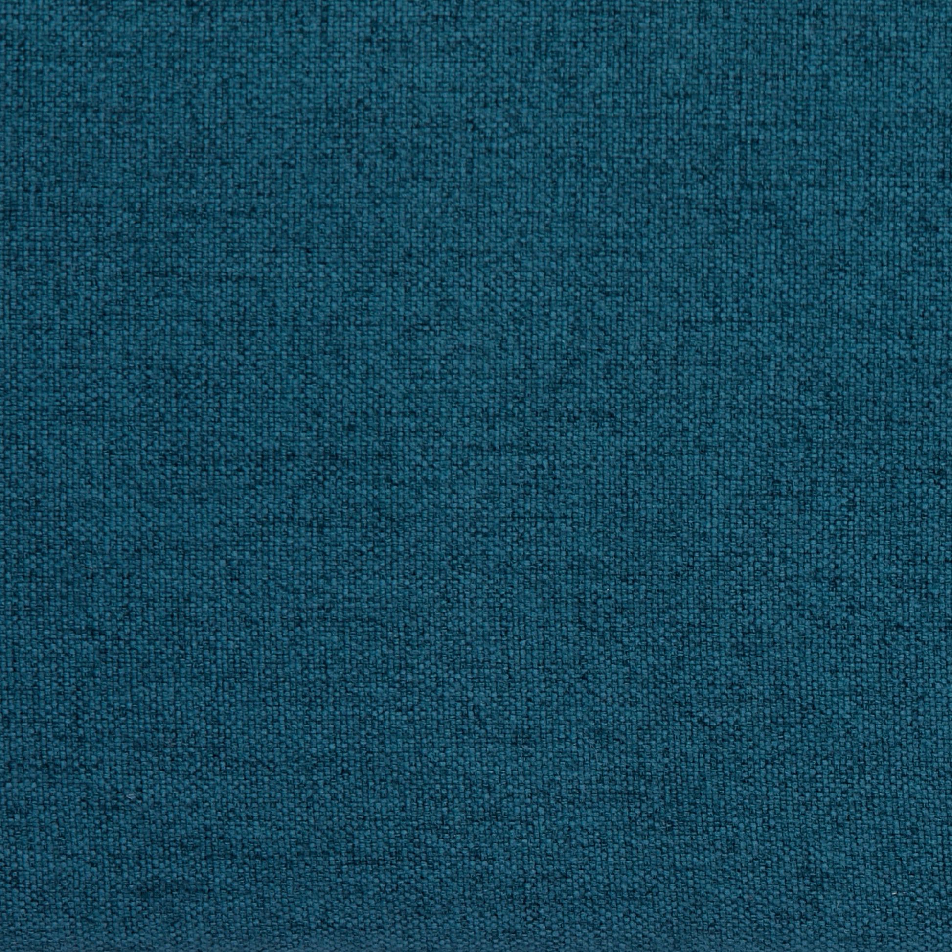 Tustin Convertible Chair in Peacock Blue featuring a close-up of the rich blue-green upholstery with a fine woven texture and subtle tonal variation.