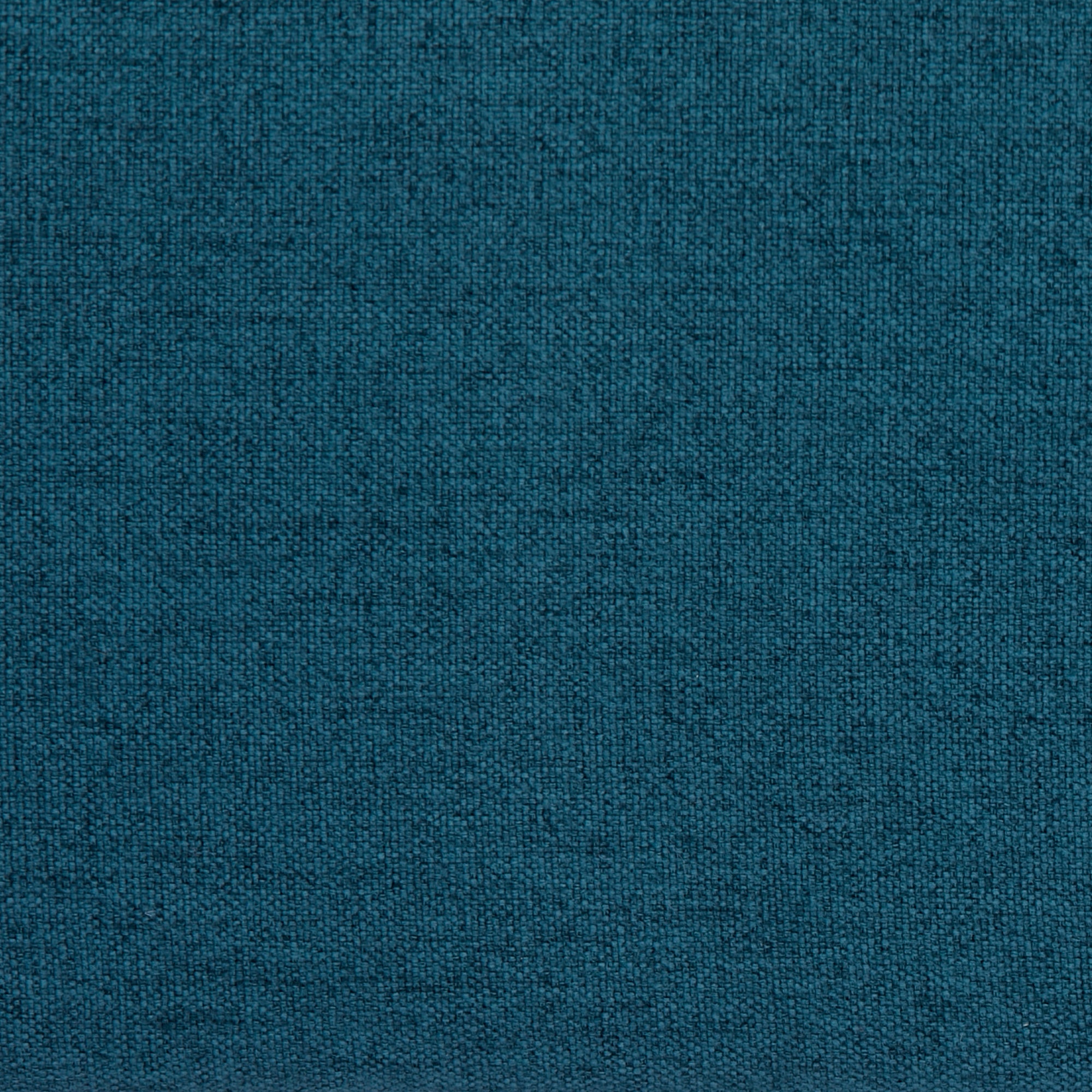 Tustin Convertible Chair in Peacock Blue featuring a close-up of the rich blue-green upholstery with a fine woven texture and subtle tonal variation.