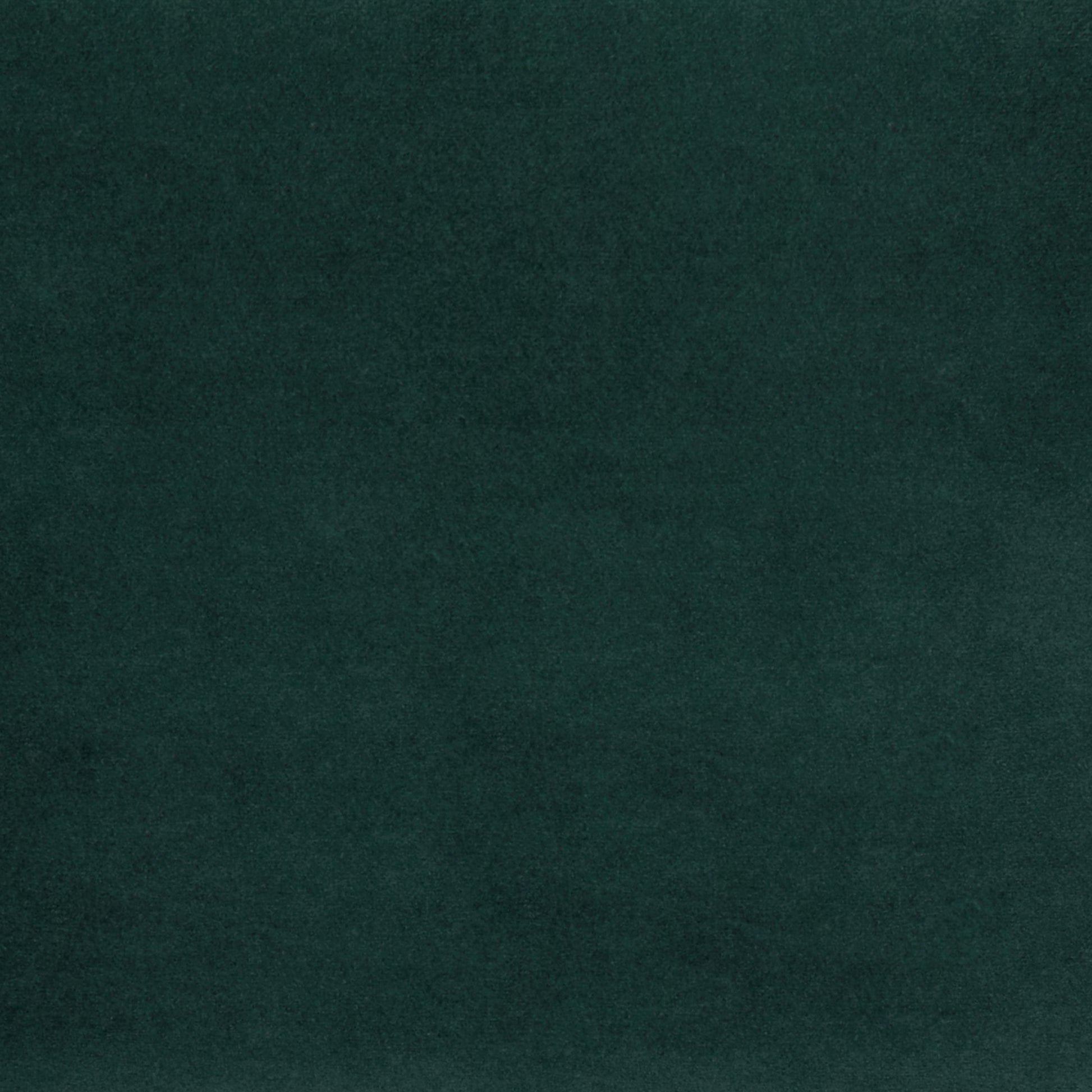 Tustin Convertible Chair in Velvet Green featuring a close-up of the deep green velvet upholstery with a smooth pile, soft sheen, and subtle tonal variation.