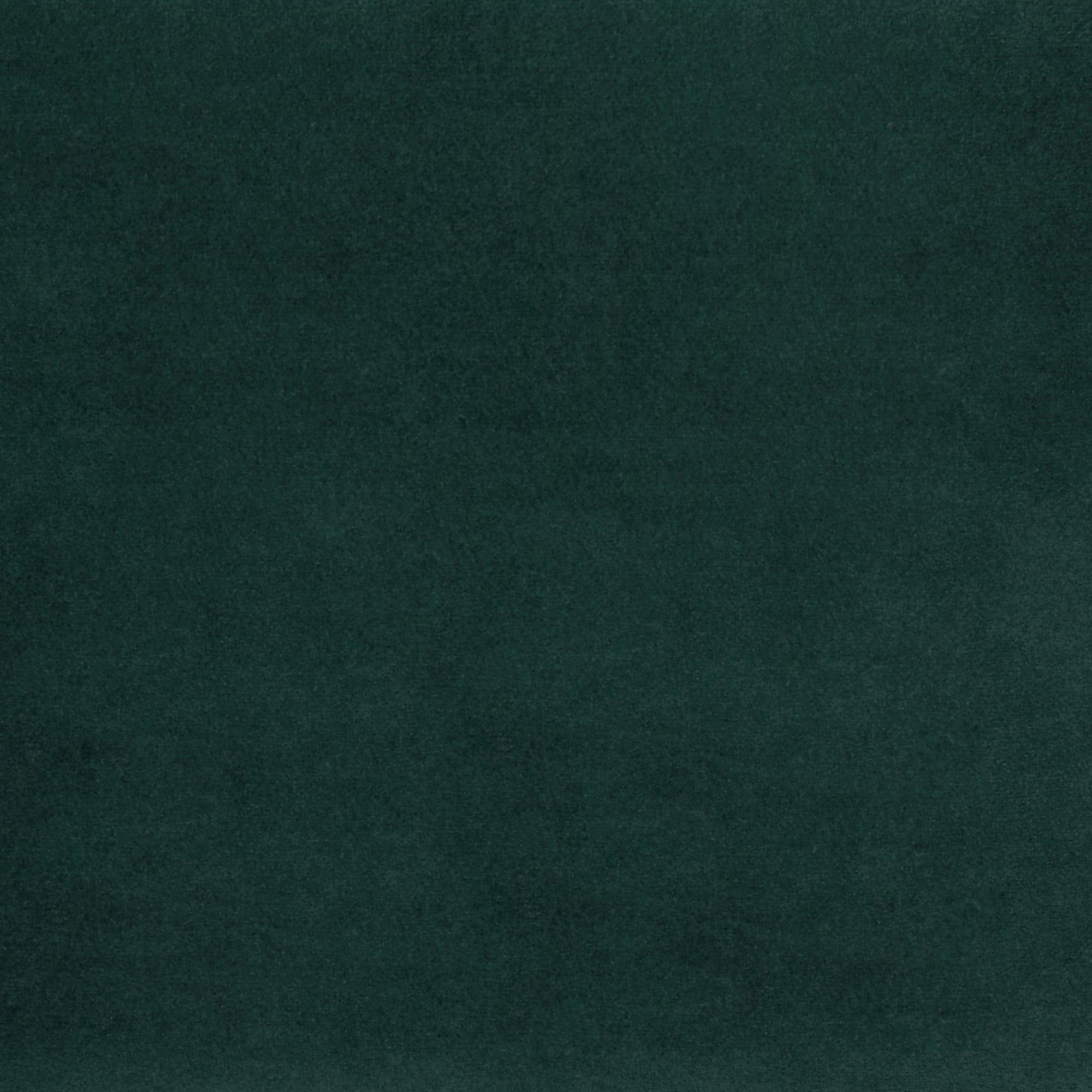 Tustin Convertible Chair in Velvet Green featuring a close-up of the deep green velvet upholstery with a smooth pile, soft sheen, and subtle tonal variation.
