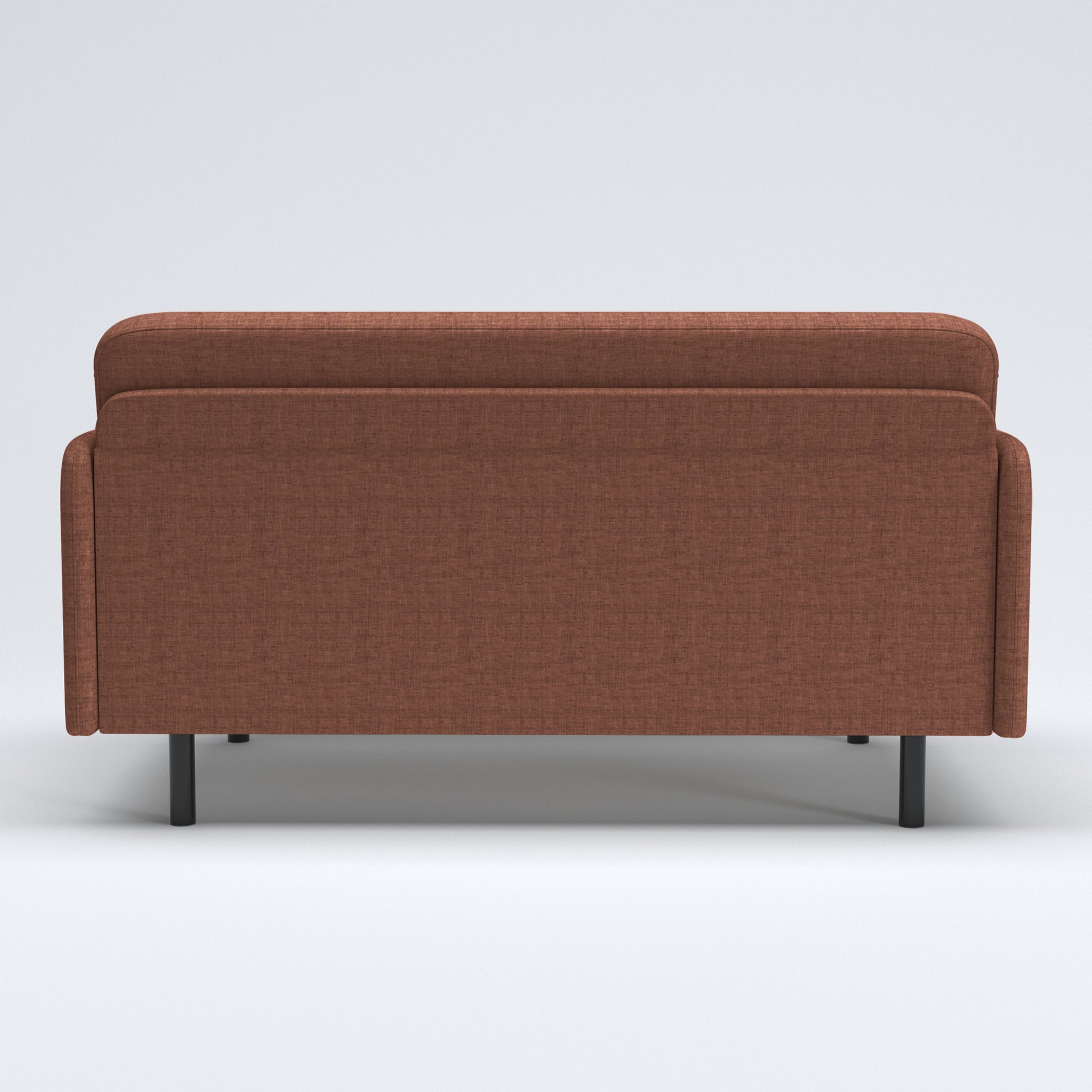 Metro Loveseat in Rosewood Blush shown from the back with a broad upholstered rear panel, rounded backrest edge, narrow side panels, and black cylindrical legs.