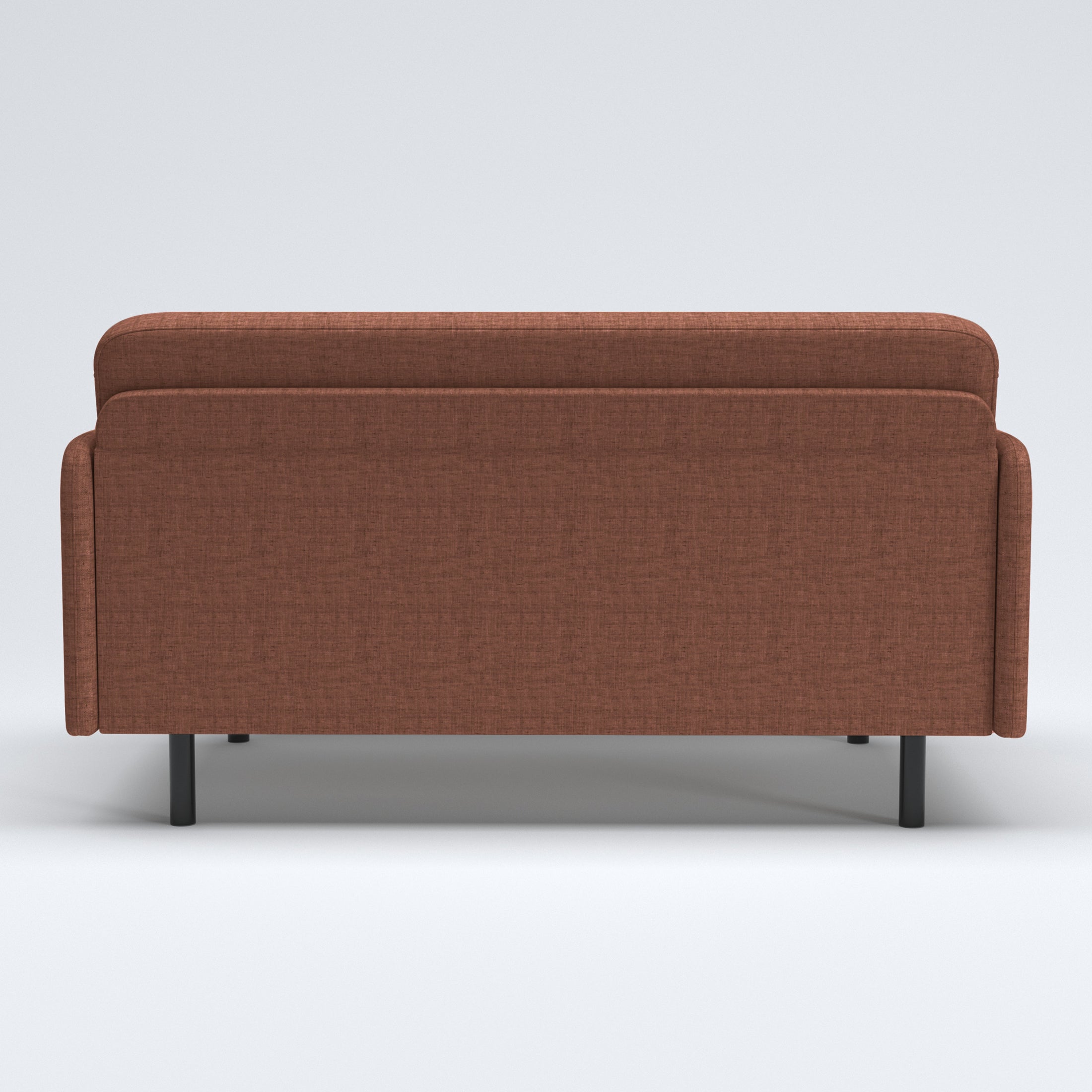 Metro Loveseat in Rosewood Blush shown from the back with a broad upholstered rear panel, rounded backrest edge, narrow side panels, and black cylindrical legs.