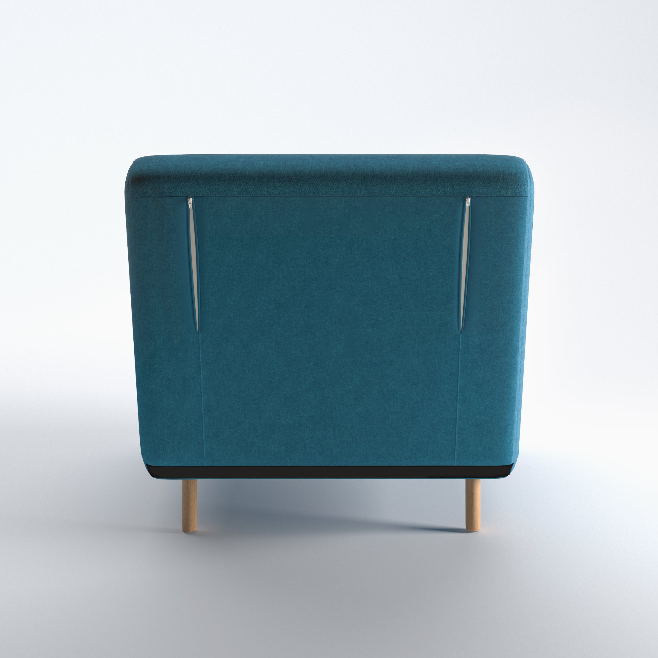 Tustin Convertible Chair in Peacock Blue shown from the rear with a fully upholstered back panel, two vertical zipper details, and natural wood legs.