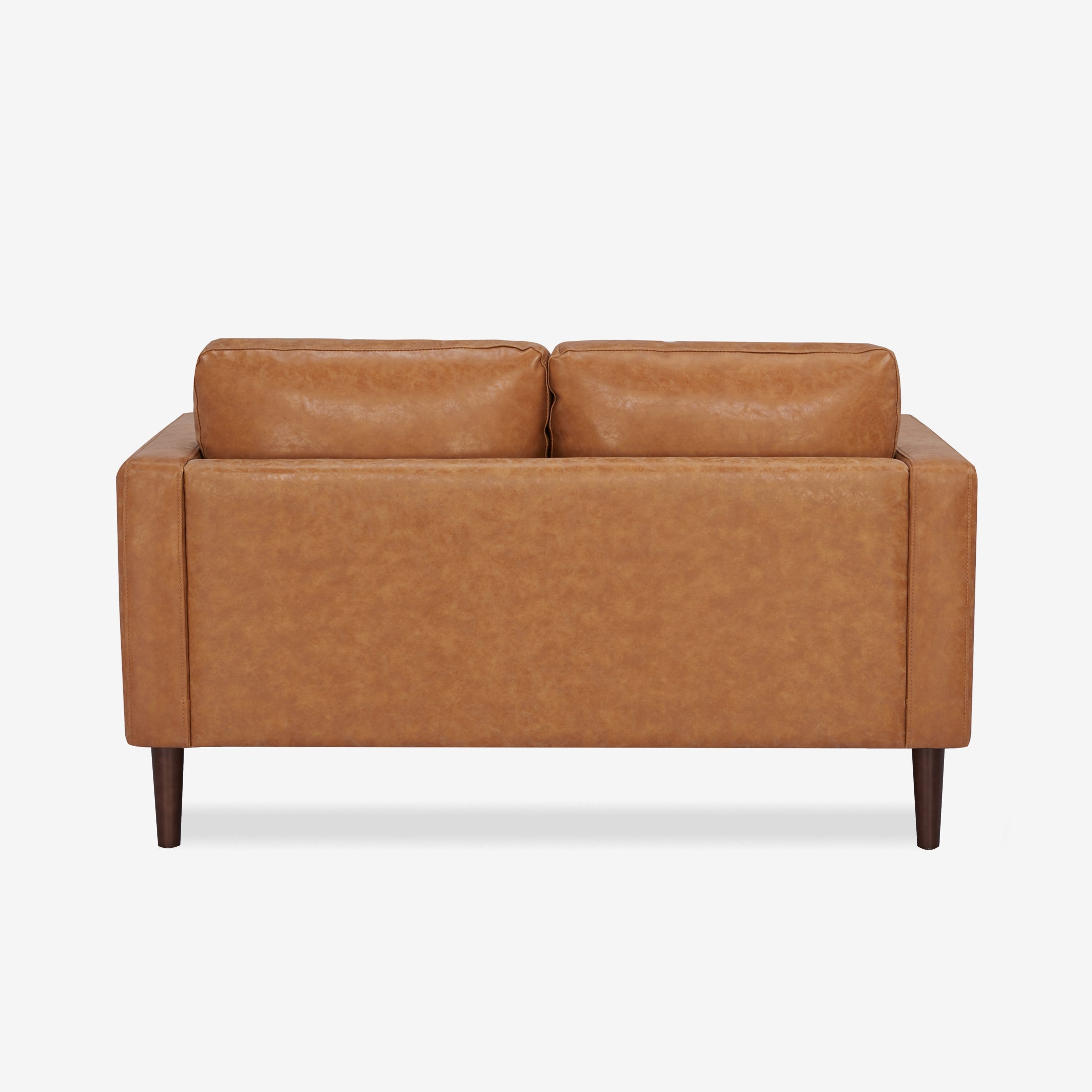 Orlando Loveseat in Faux Leather Camel shown from the rear, displaying a clean upholstered back panel, squared arms, two back cushions, and tapered legs