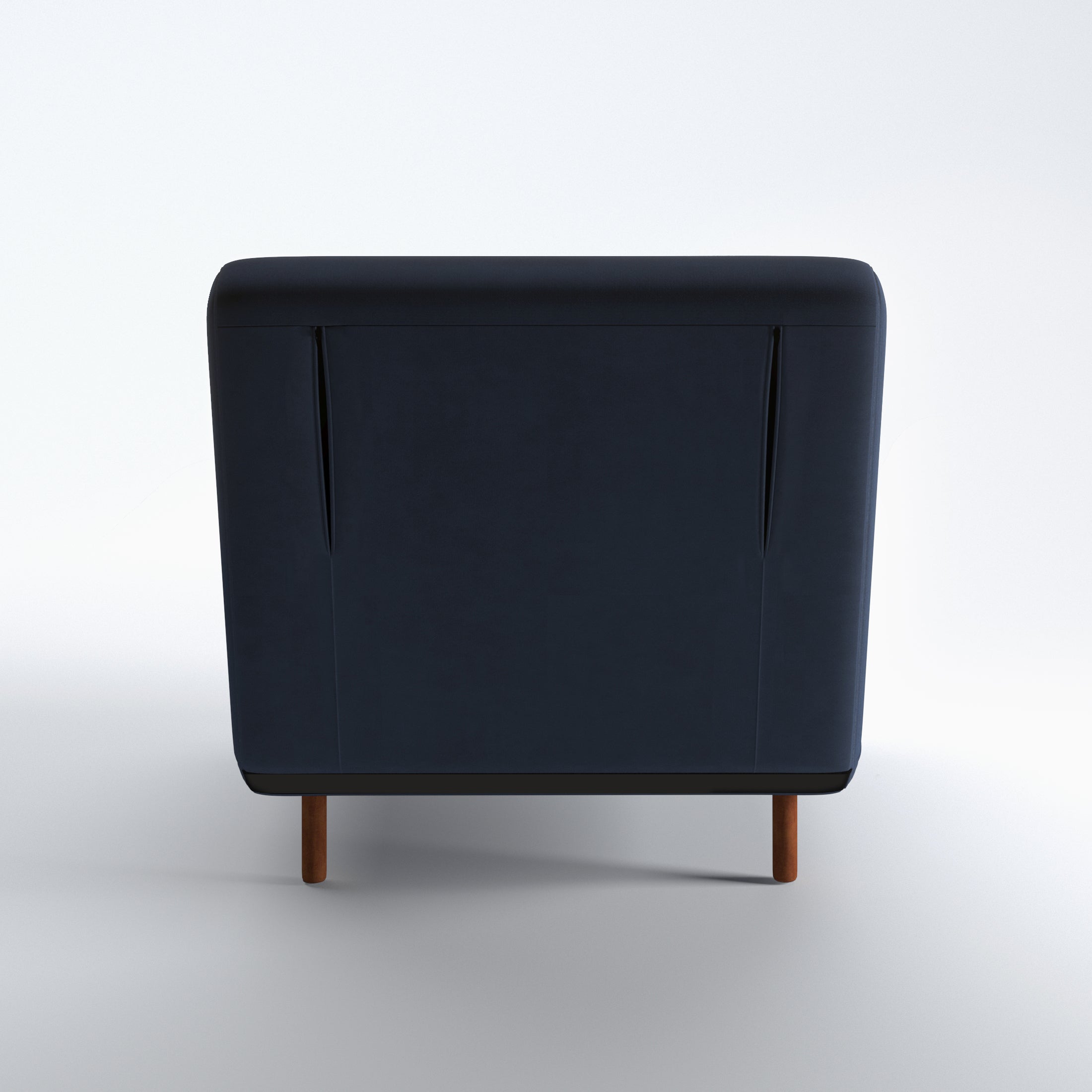 Tustin Convertible Chair in Velvet Blue shown from the rear with a fully upholstered back panel, two vertical zipper details, and dark brown wood legs.