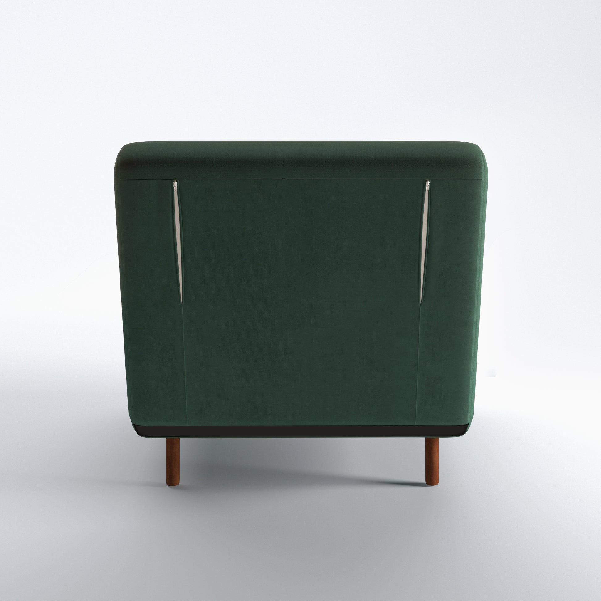 Tustin Convertible Chair in Velvet Green shown from the rear with a fully upholstered back panel, two vertical zipper details, and dark brown wood legs.