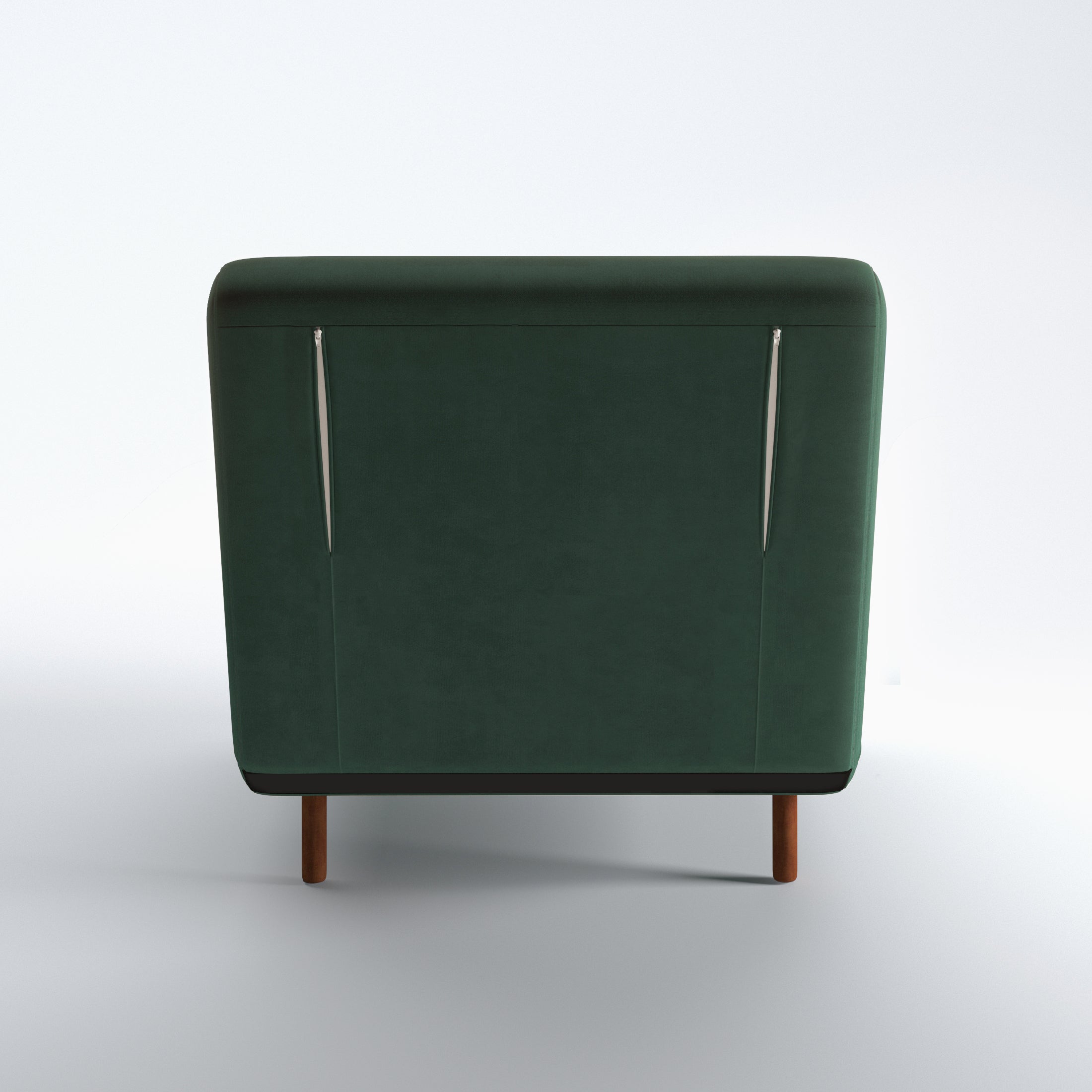 Tustin Convertible Chair in Velvet Green shown from the rear with a fully upholstered back panel, two vertical zipper details, and dark brown wood legs.