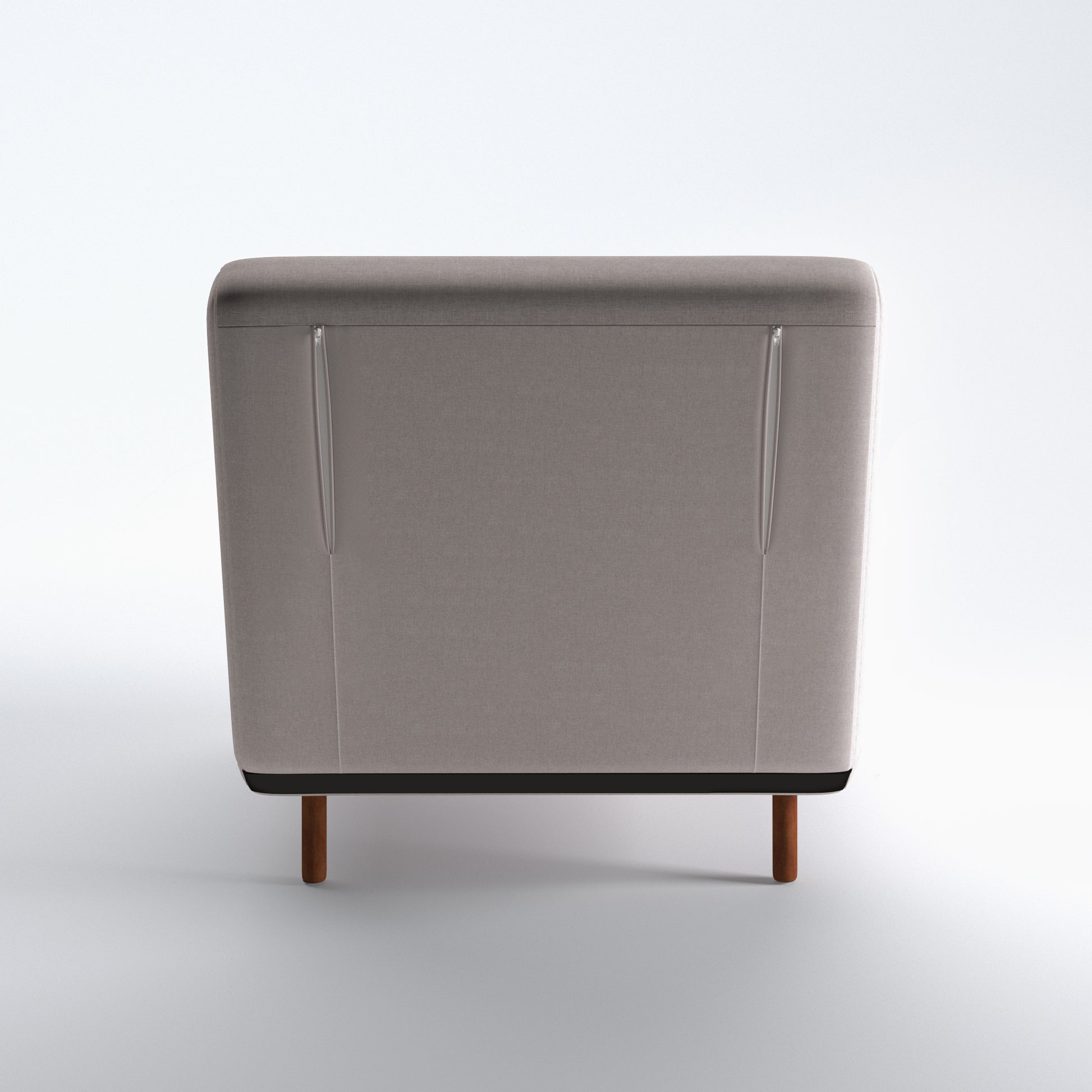 Tustin Convertible Chair in Beige shown from the rear with a fully upholstered back panel, two vertical zipper details, and dark brown wood legs.