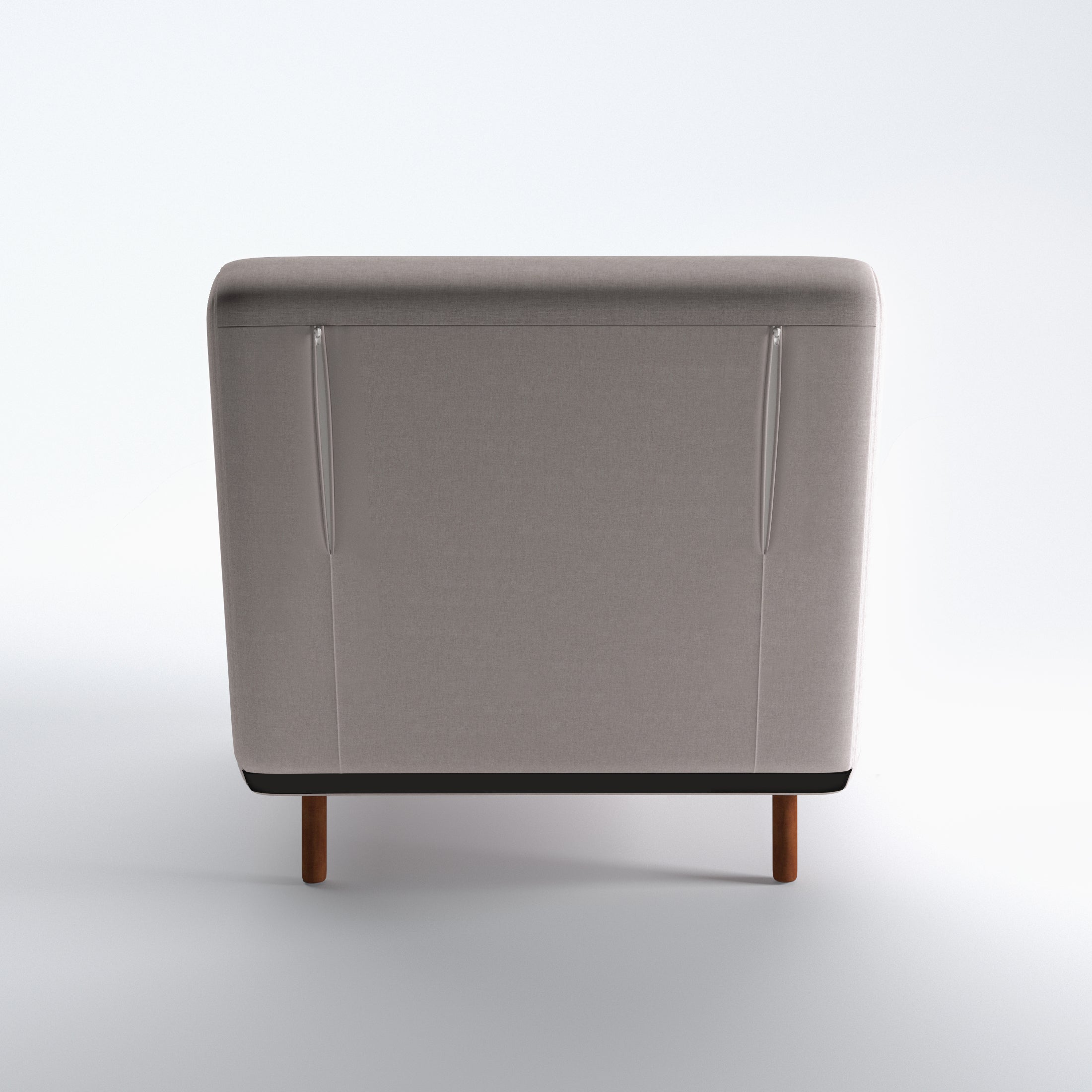 Tustin Convertible Chair in Beige shown from the rear with a fully upholstered back panel, two vertical zipper details, and dark brown wood legs.