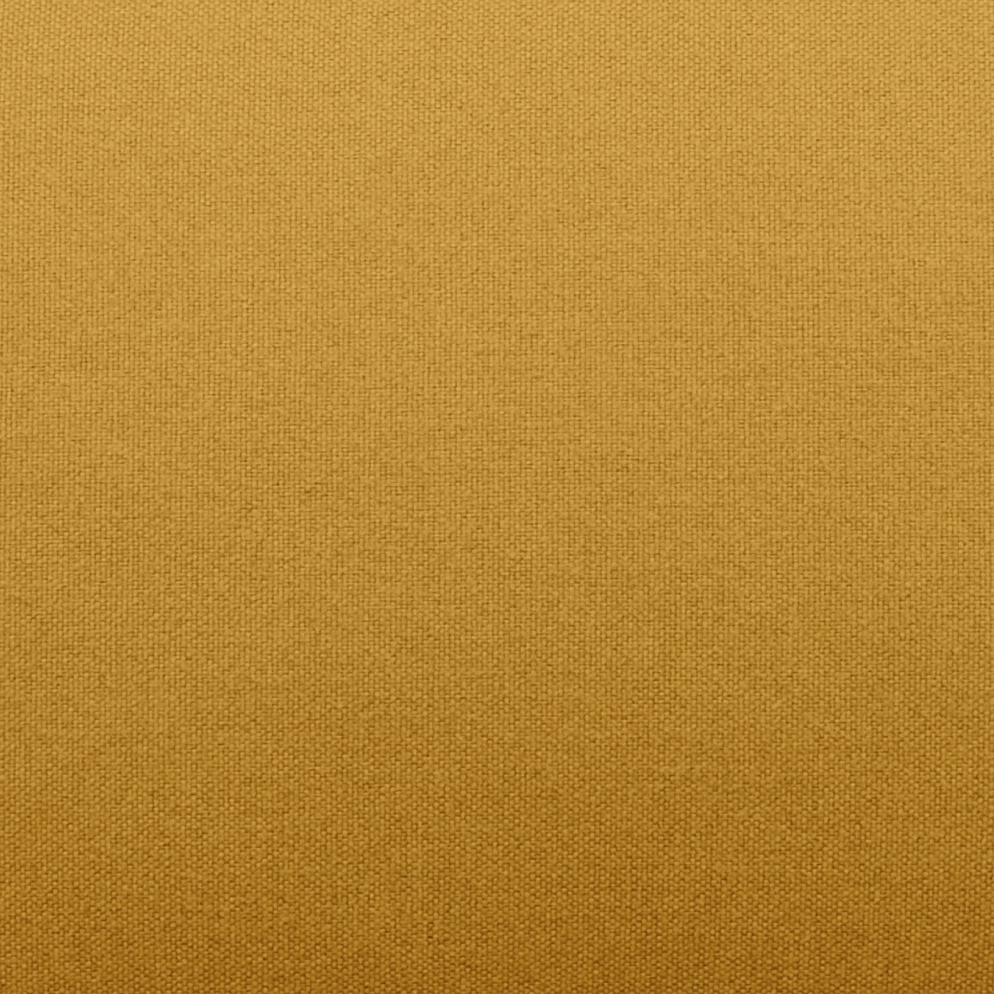 Tustin Convertible Chair in Mustard featuring a close-up of the golden mustard upholstery with a fine woven texture and subtle tonal variation