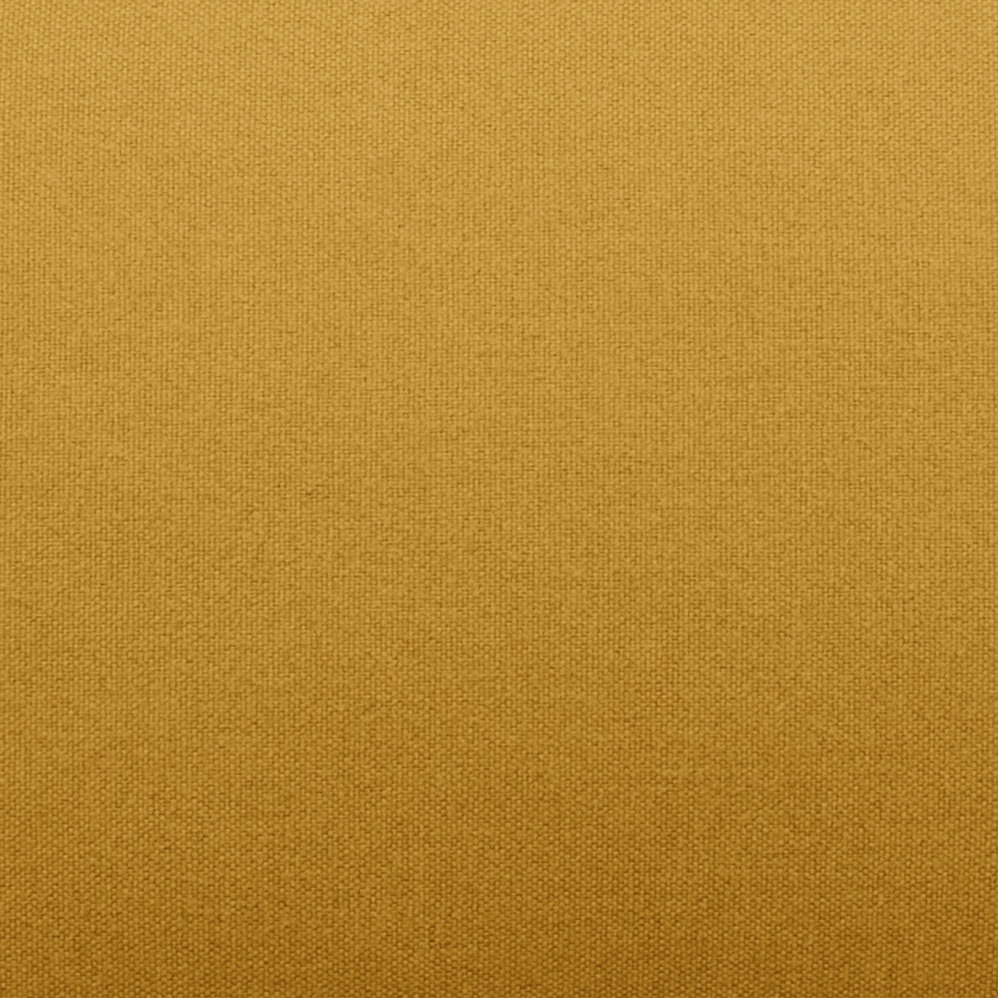 Tustin Convertible Chair in Mustard featuring a close-up of the golden mustard upholstery with a fine woven texture and subtle tonal variation