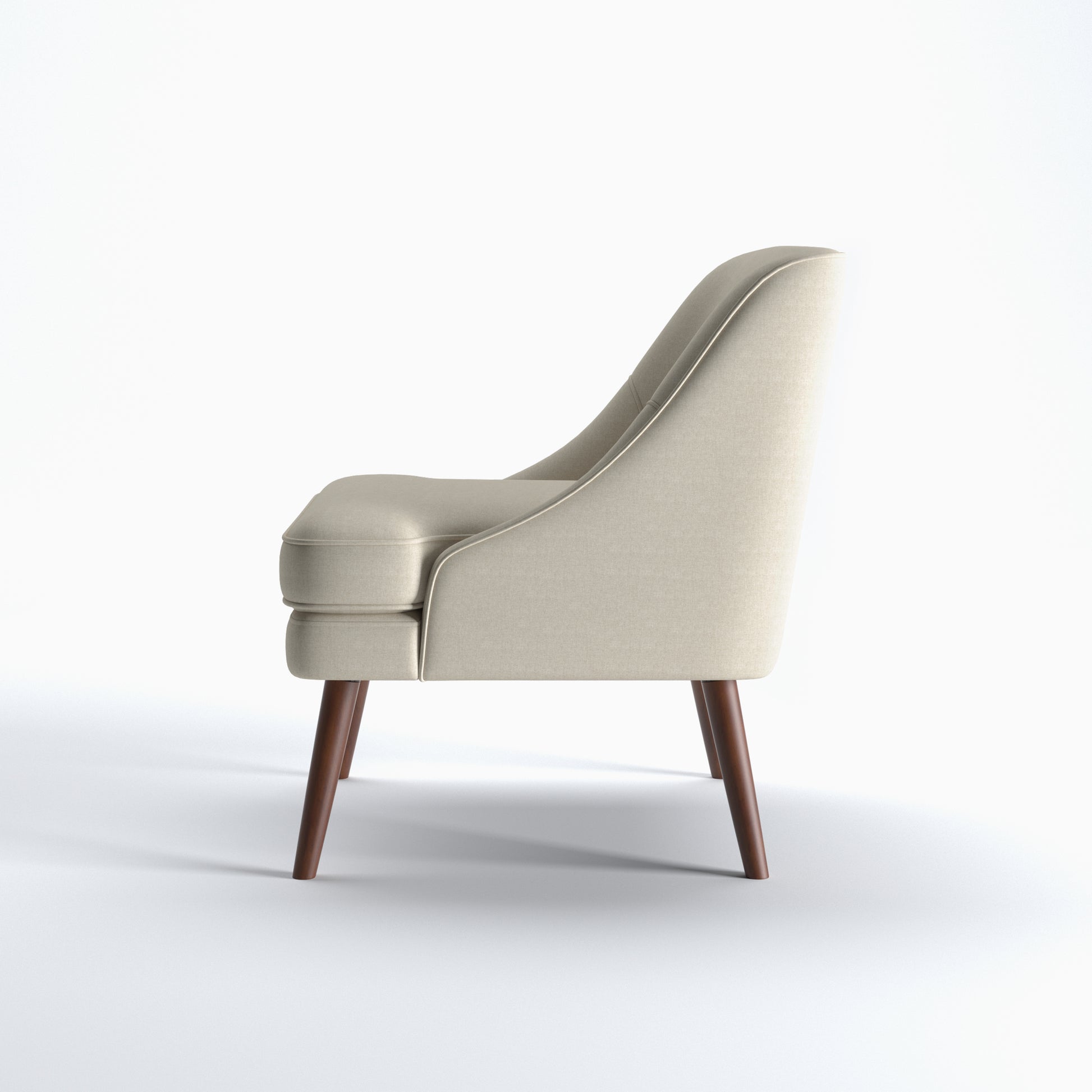 Dana Accent Chair in Faux Linen Beige shown from the side with a gently sloped back, integrated arm profile, thick seat cushion, and angled brown legs