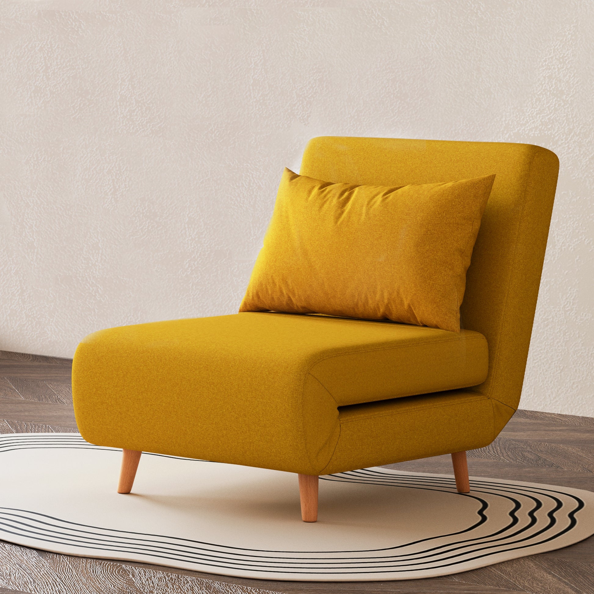 Tustin Convertible Chair in Mustard styled on a patterned rug with an armless silhouette, matching lumbar pillow, rounded seat, and tapered natural wood legs