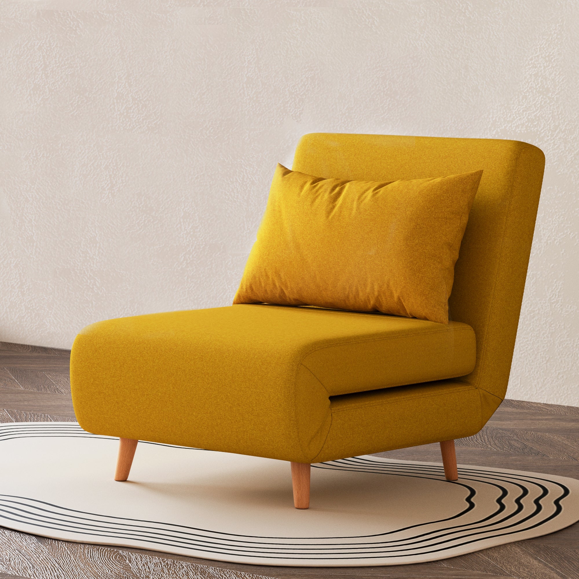 Tustin Convertible Chair in Mustard styled on a patterned rug with an armless silhouette, matching lumbar pillow, rounded seat, and tapered natural wood legs